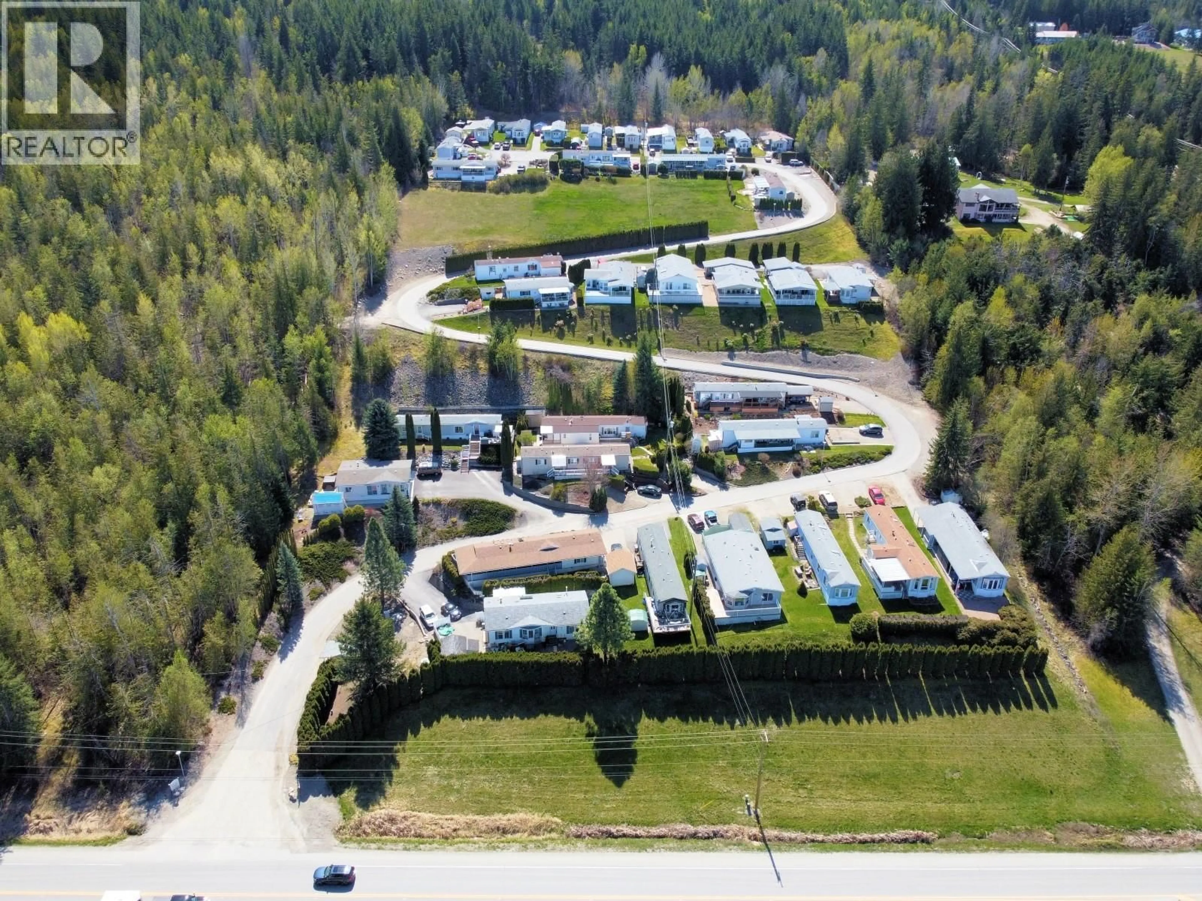 A pic from outside/outdoor area/front of a property/back of a property/a pic from drone, street for 7 - 1420 TRANS CANADA HIGHWAY HIGHWAY, Sorrento British Columbia V0E2W0