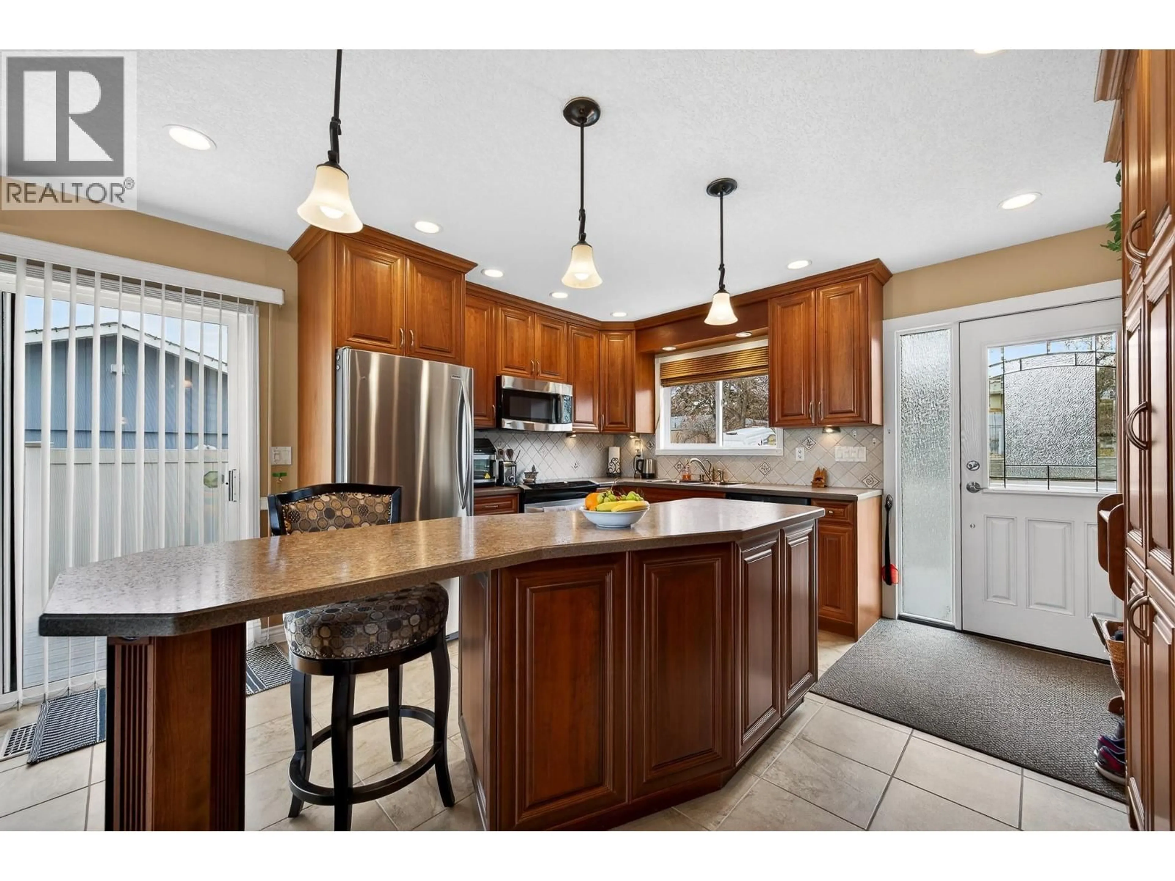 Open concept kitchen, ceramic/tile floor for 694&696 LOMBARD STREET, Kamloops British Columbia V2C5W6