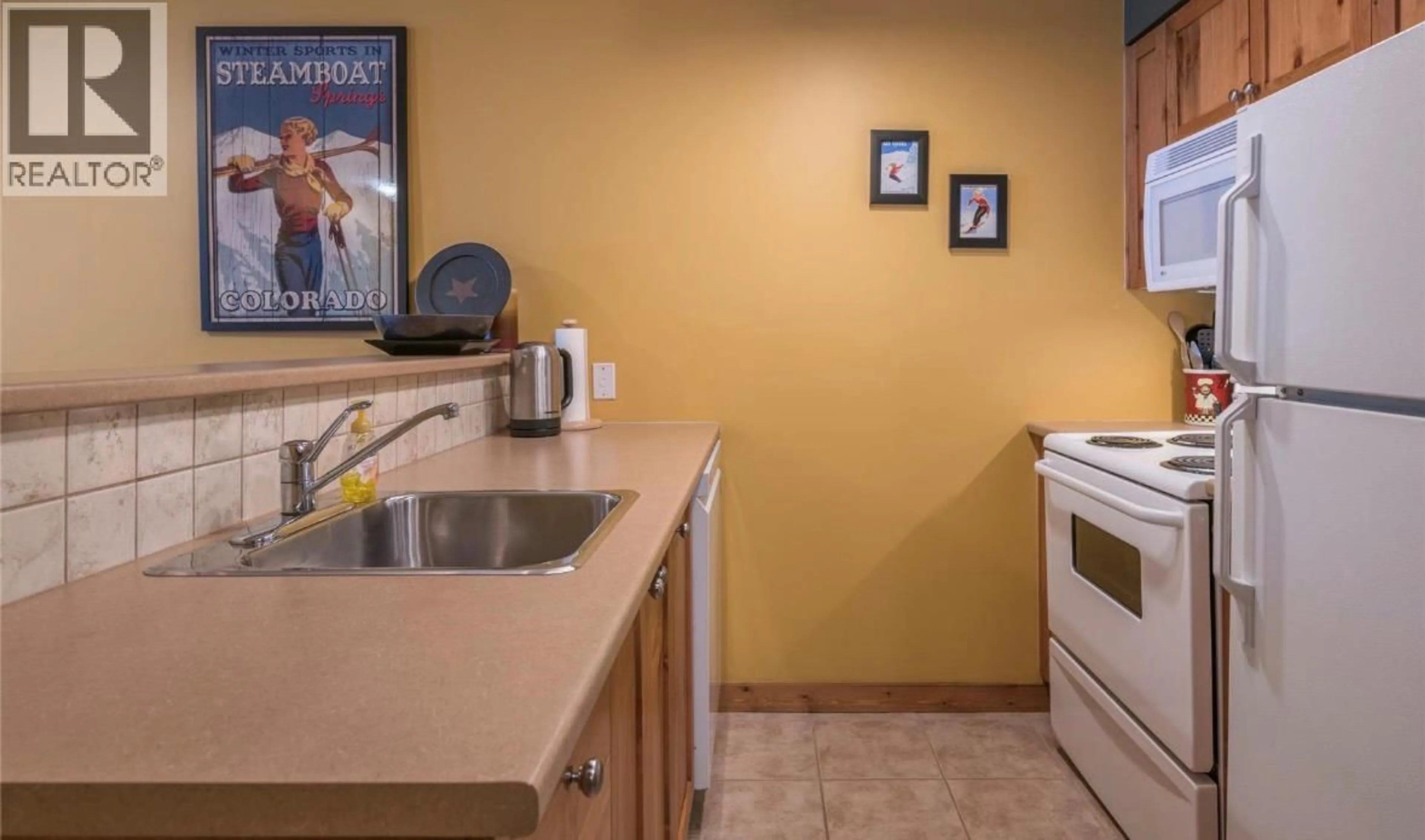 Standard kitchen, ceramic/tile floor for 305 - 9812 SILVER STAR ROAD, Vernon British Columbia v1b3Y9