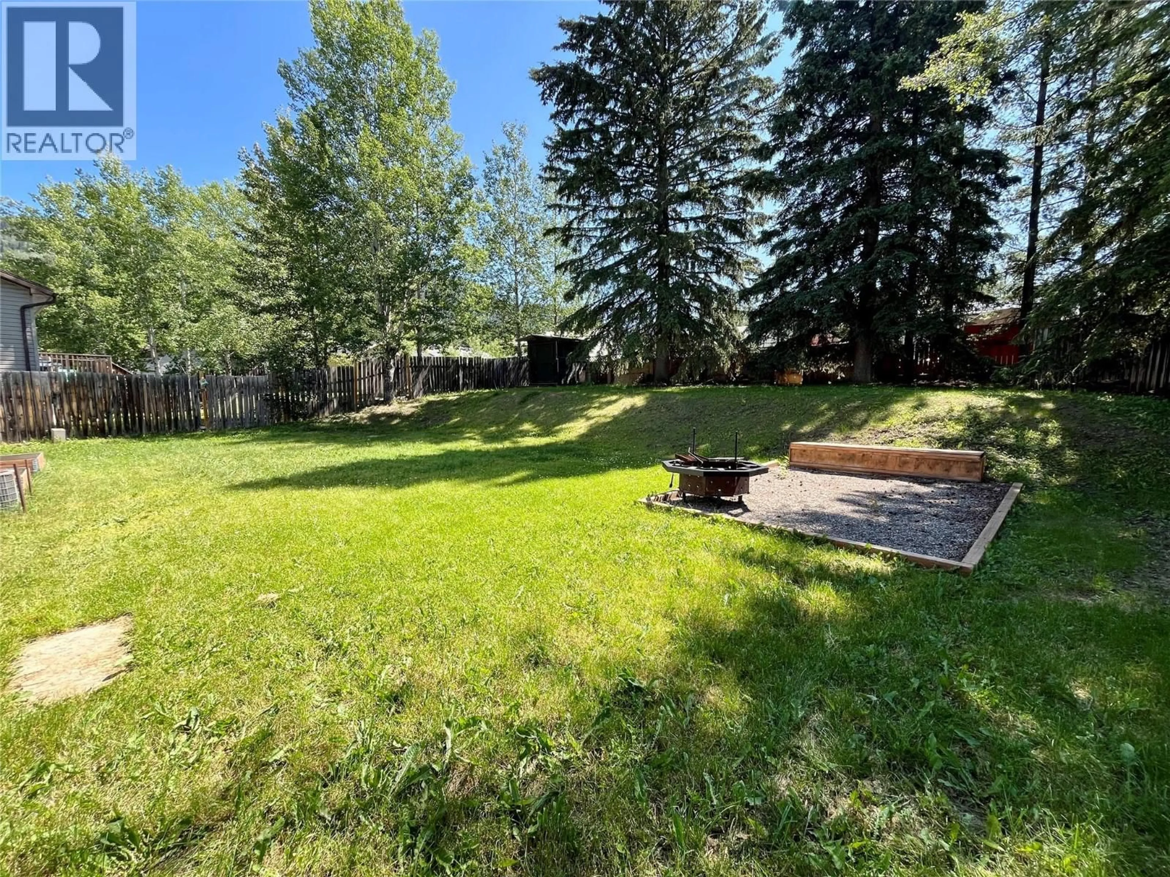 A pic from outside/outdoor area/front of a property/back of a property/a pic from drone, forest/trees view for 268 MURRAY DRIVE, Tumbler Ridge British Columbia V0C2W0