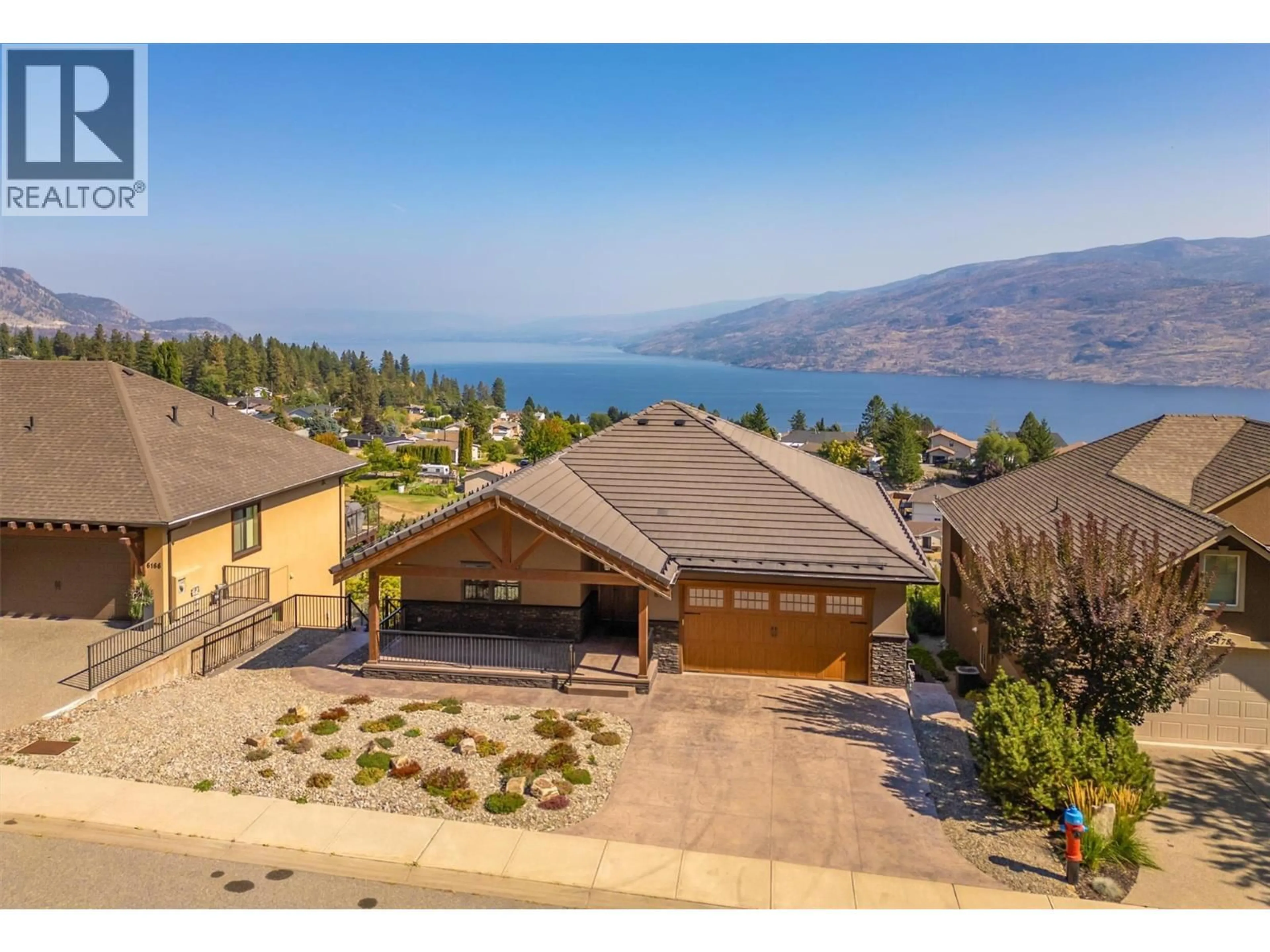 A pic from outside/outdoor area/front of a property/back of a property/a pic from drone, water/lake/river/ocean view for 6172 SEYMOURE AVENUE, Peachland British Columbia V0H1X4