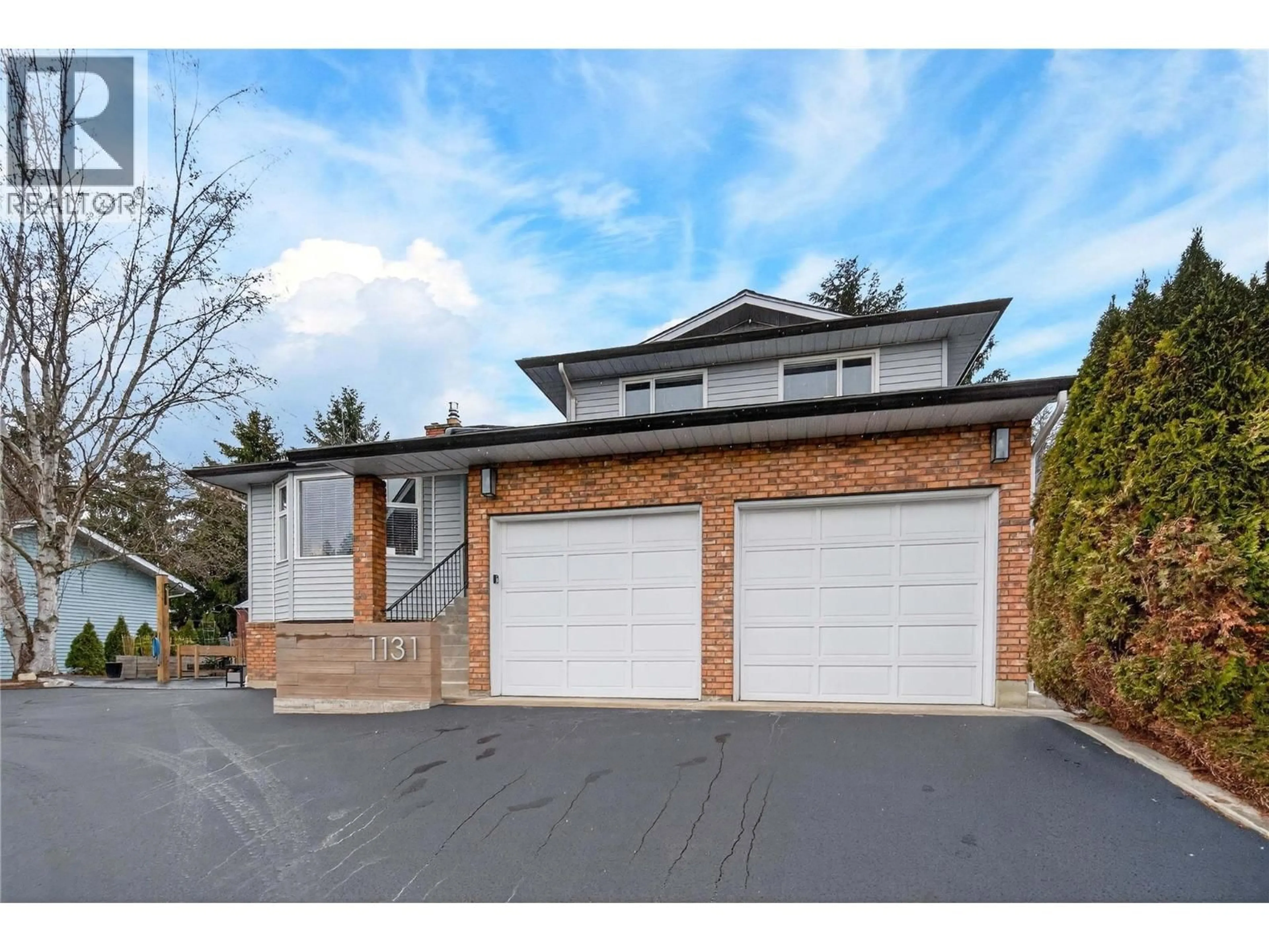 Home with brick exterior material, street for 1131 49 AVENUE NORTHEAST, Salmon Arm British Columbia V1E3P1