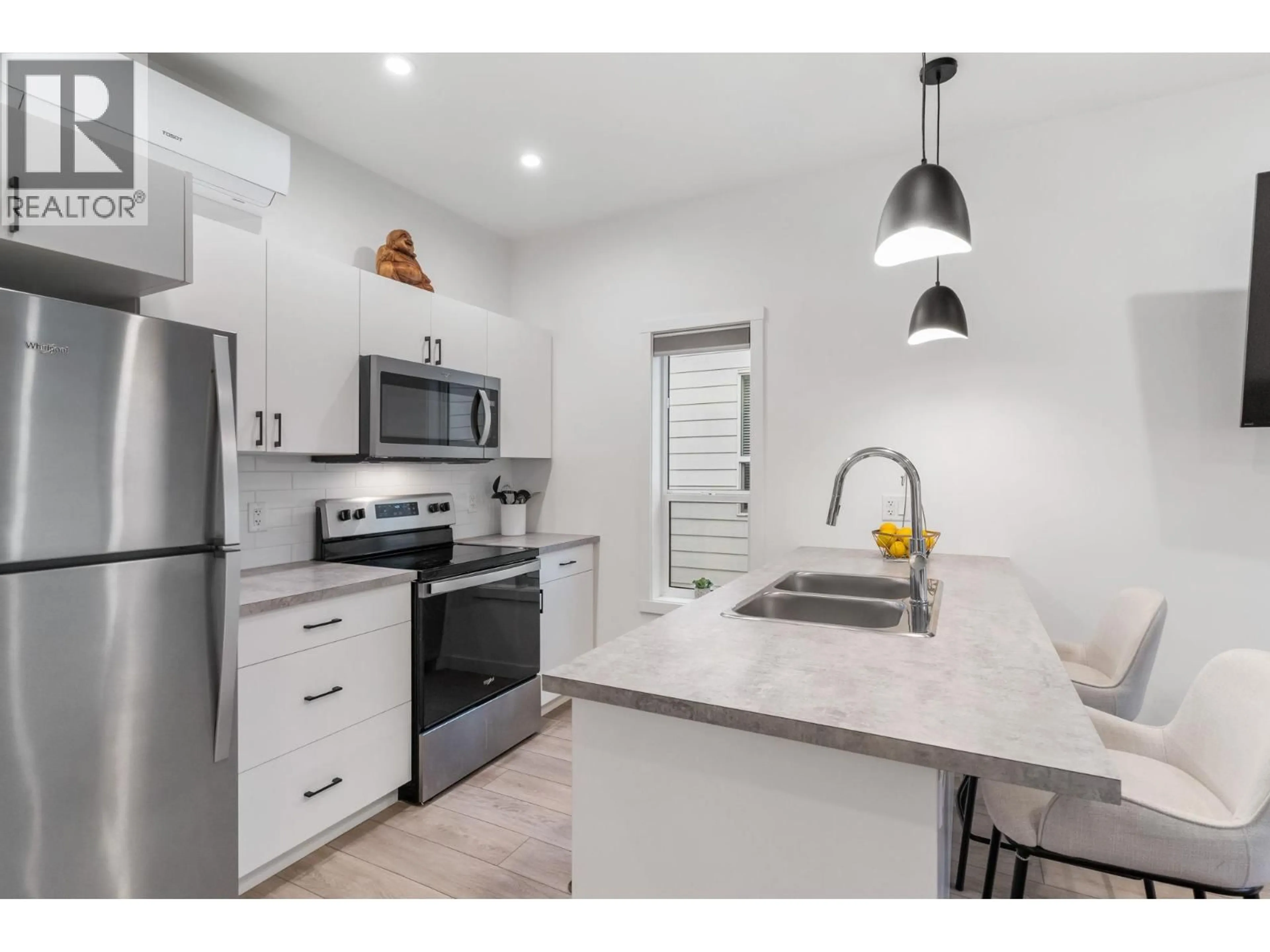 Open concept kitchen, ceramic/tile floor for 172 - 8900 JIM BAILEY ROAD, Kelowna British Columbia V4V0B5