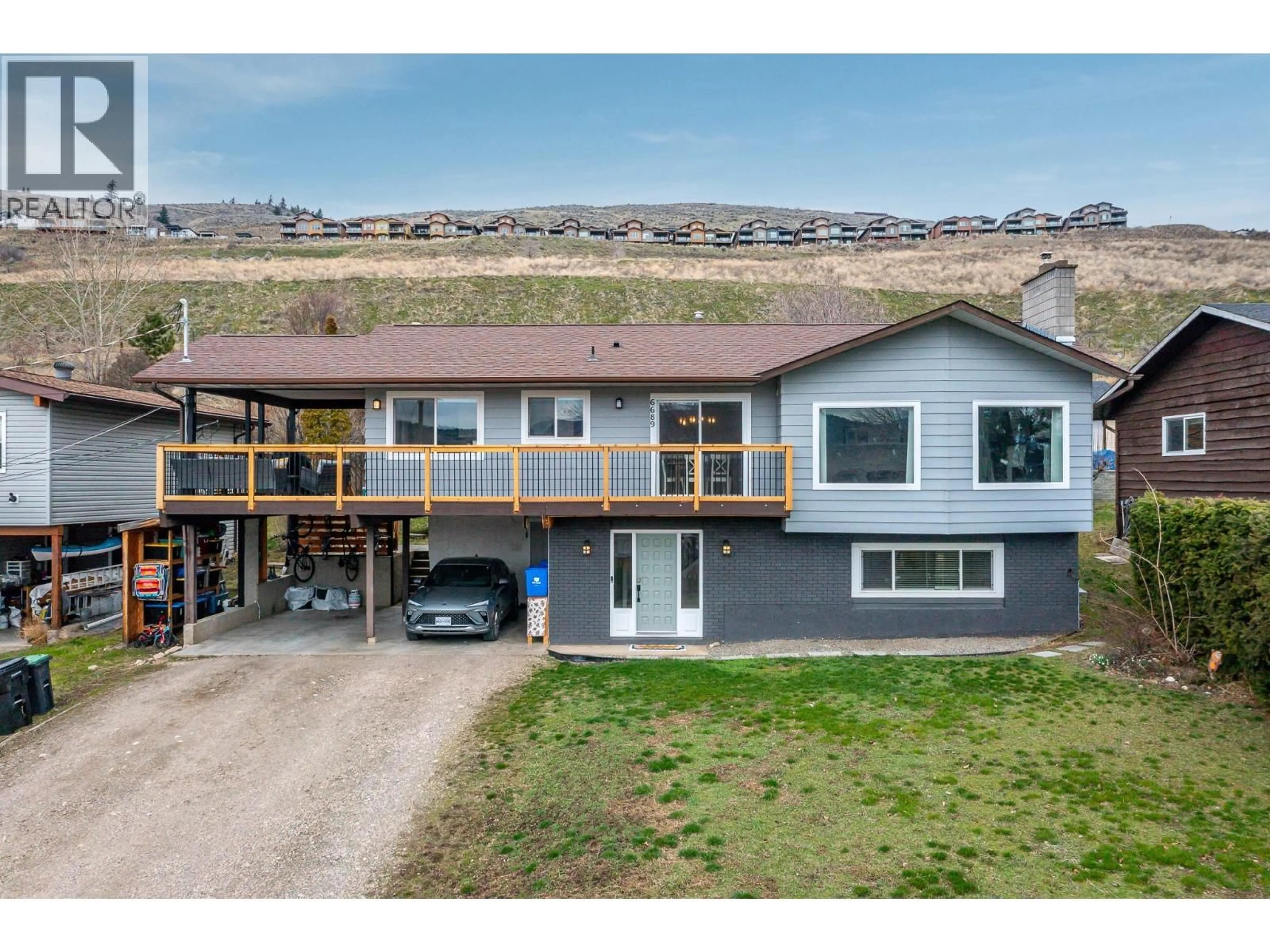 A pic from outside/outdoor area/front of a property/back of a property/a pic from drone, unknown for 6689 SOUTHWIND ROAD, Vernon British Columbia V1H1B7