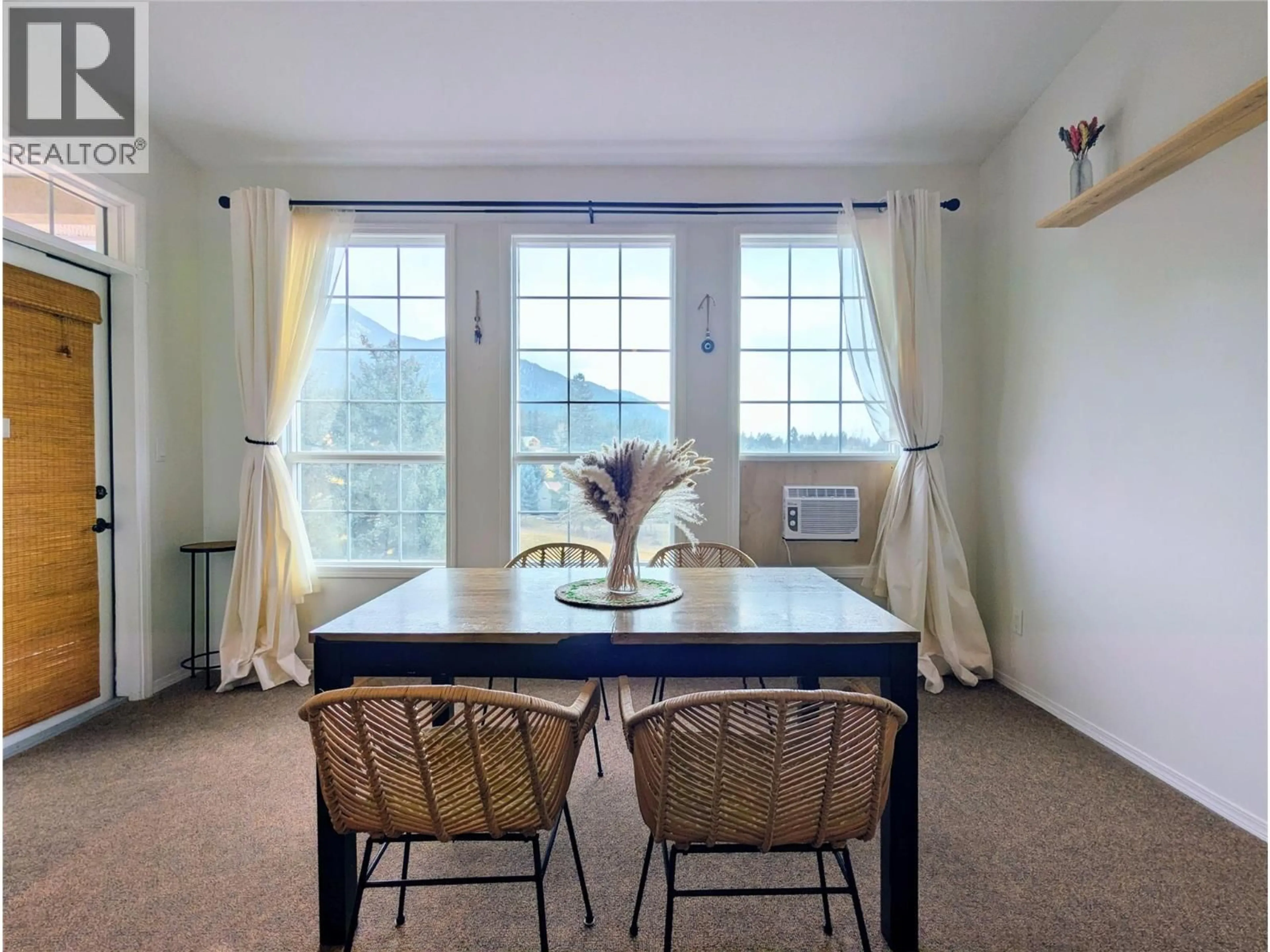 Dining room, wood/laminate floor for 1013A - 5052 RIVERVIEW ROAD, Fairmont Hot Springs British Columbia V0B1L1