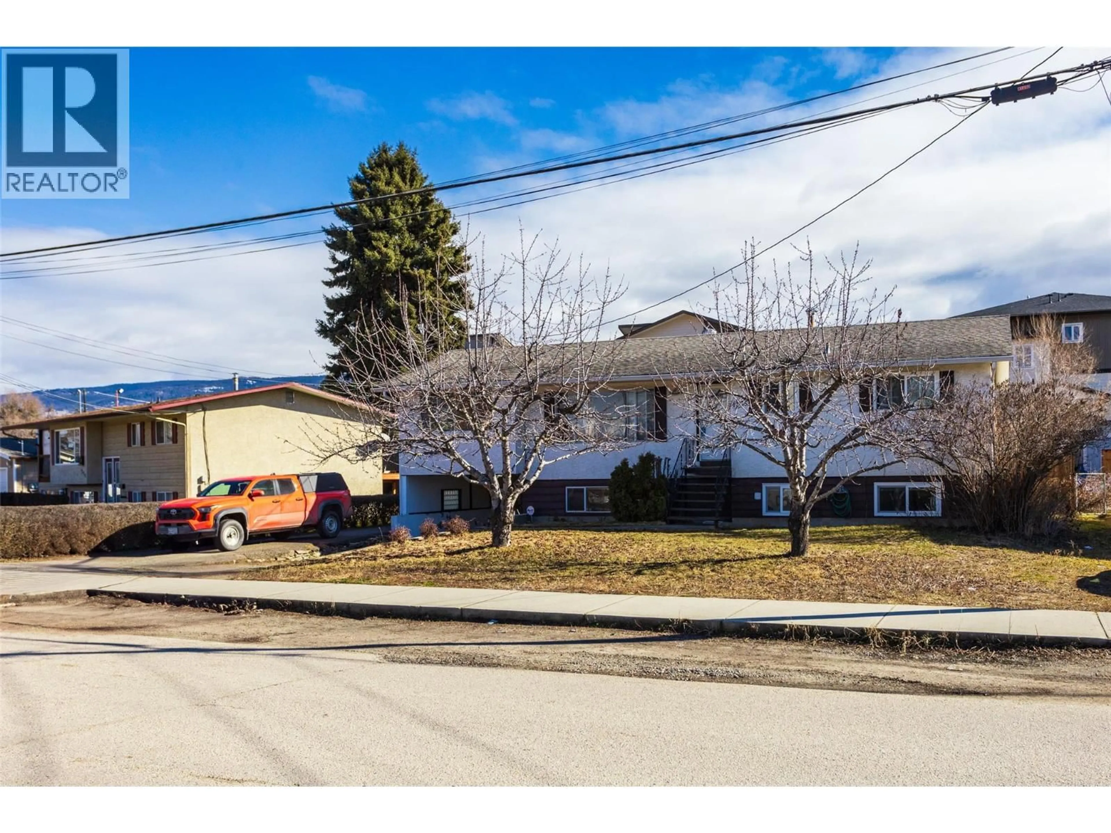 A pic from outside/outdoor area/front of a property/back of a property/a pic from drone, street for 1335 ALDON ROAD, Kelowna British Columbia V1X5A1