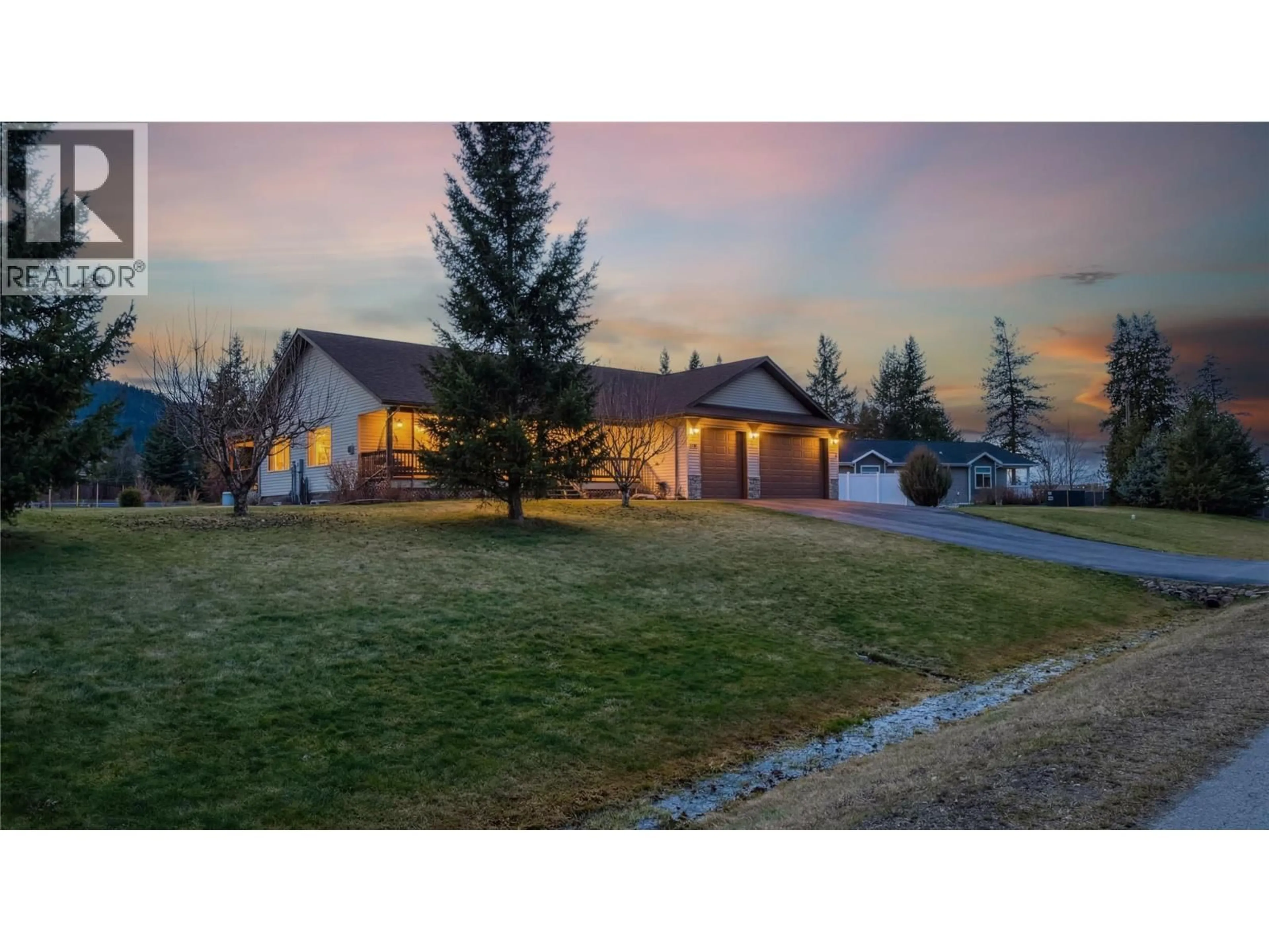 A pic from outside/outdoor area/front of a property/back of a property/a pic from drone, mountain view for 1333 8TH AVENUE NORTH, Creston British Columbia V0B1G6
