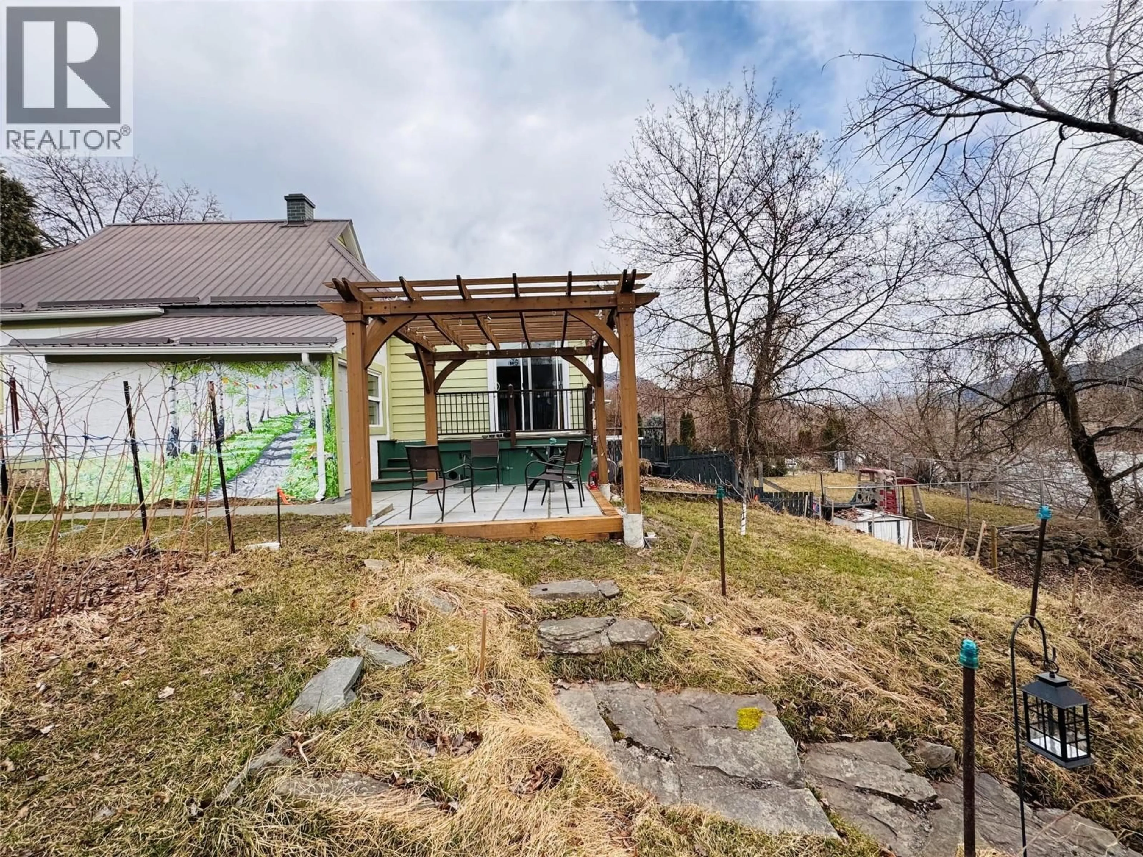 Patio, mountain view for 904 KETTLE RIVER DRIVE, Grand Forks British Columbia V0H1H0