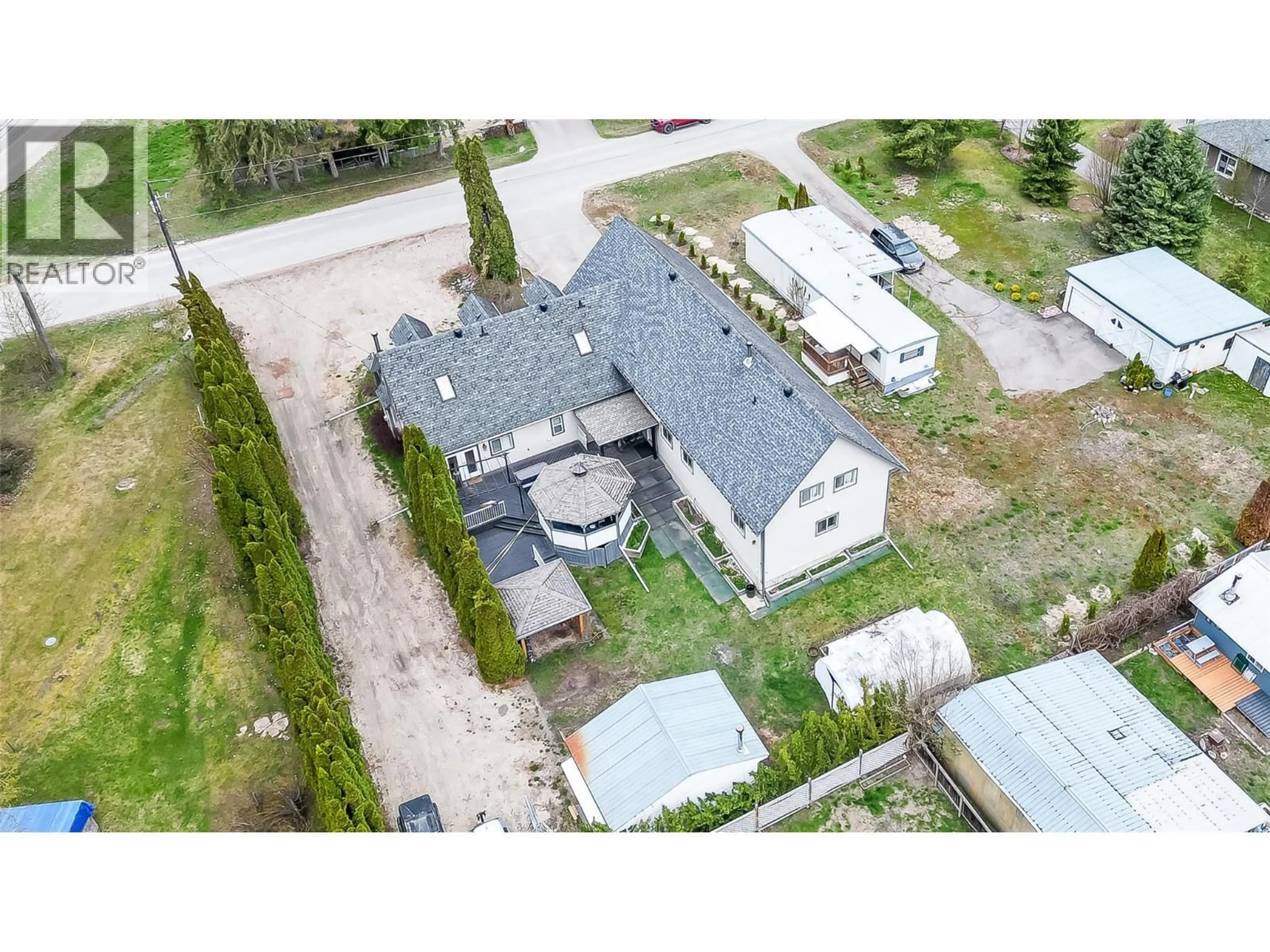 A pic from outside/outdoor area/front of a property/back of a property/a pic from drone, street for 401 GILLIS AVENUE, Sicamous British Columbia V0E2V1