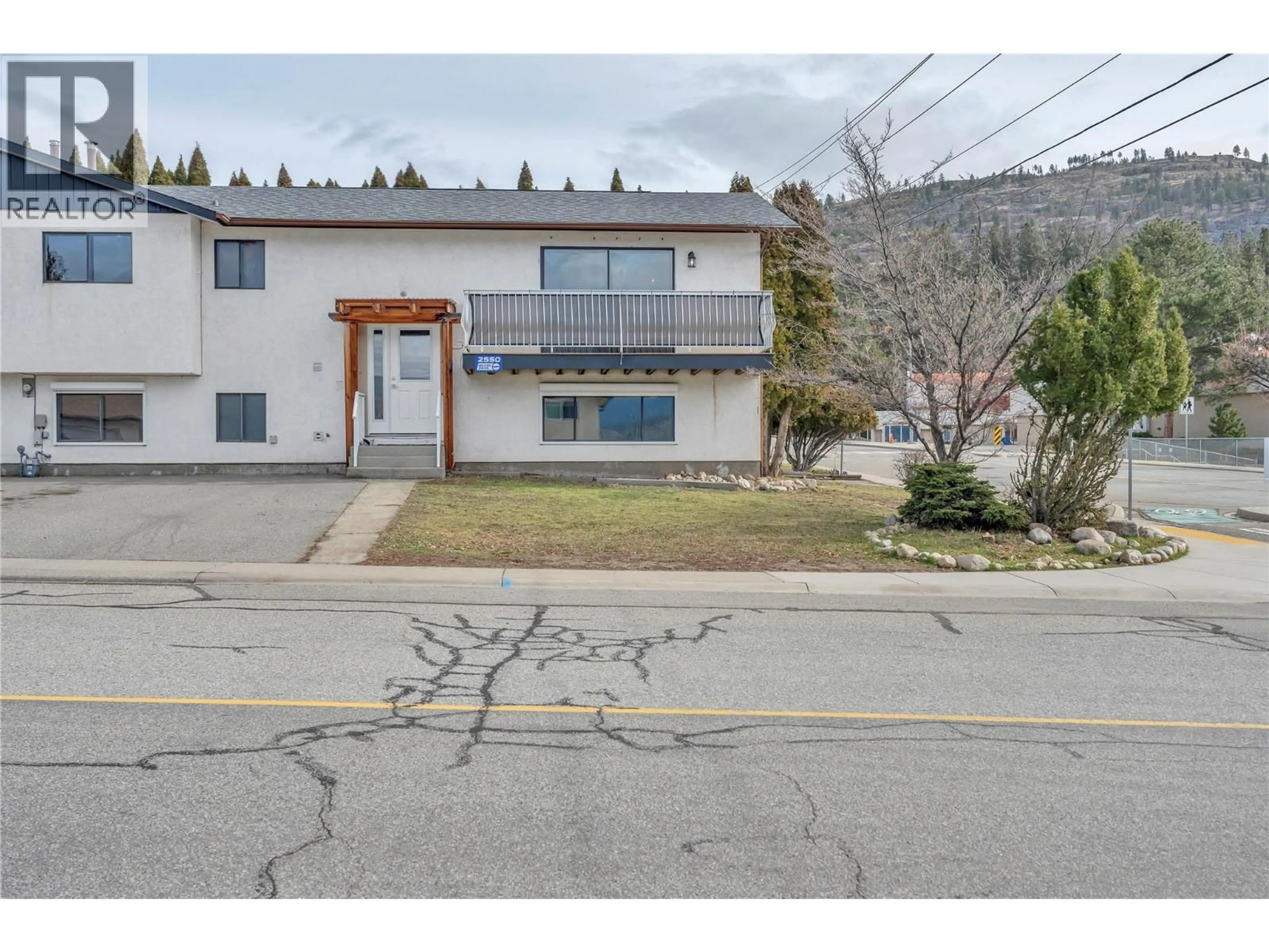 A pic from outside/outdoor area/front of a property/back of a property/a pic from drone, street for 2550 WILTSE DRIVE, Penticton British Columbia V2A7X5