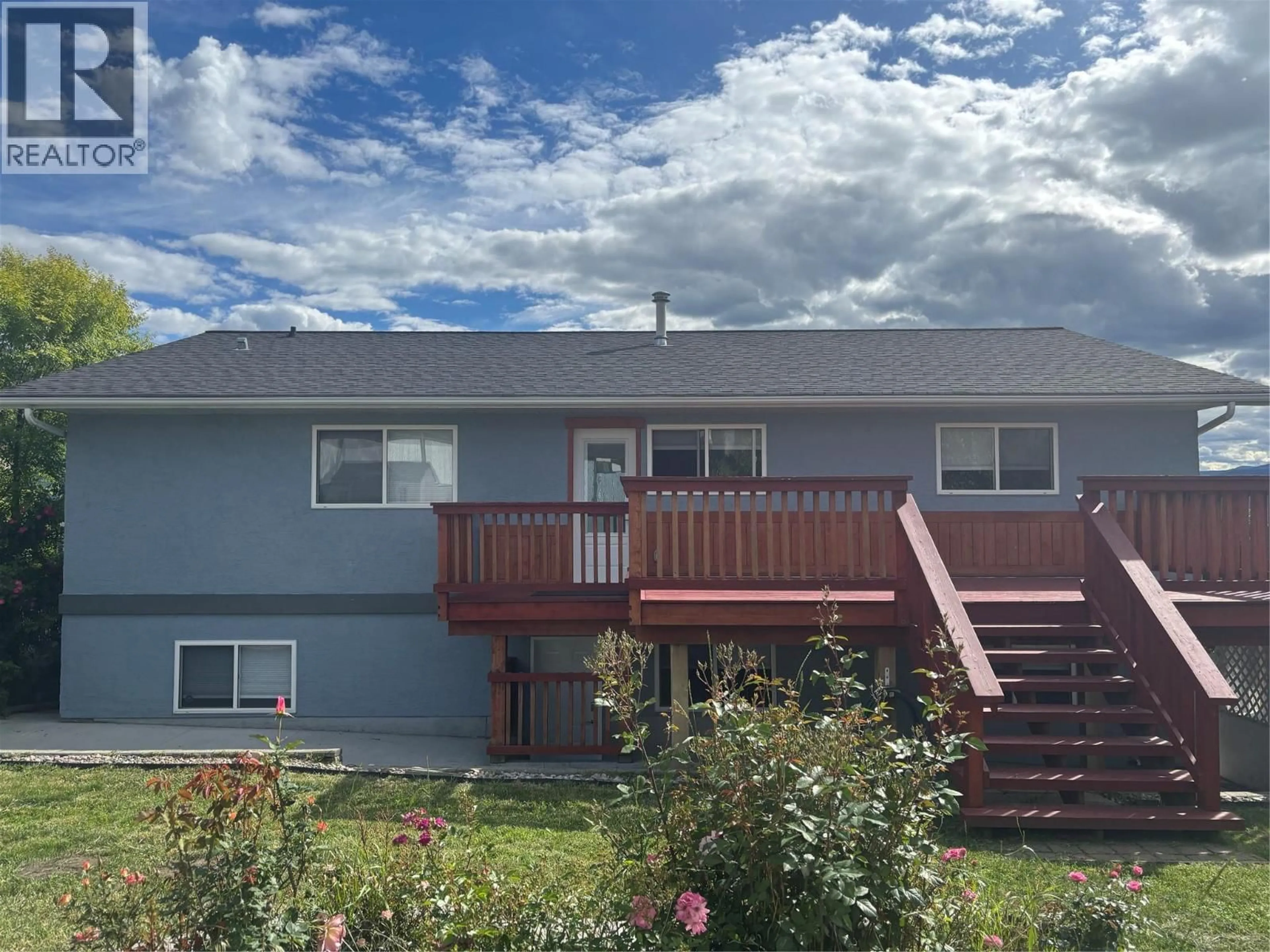 Home with vinyl exterior material, mountain view for 7415 VALLEY HEIGHTS DRIVE, Grand Forks British Columbia V0H1H0
