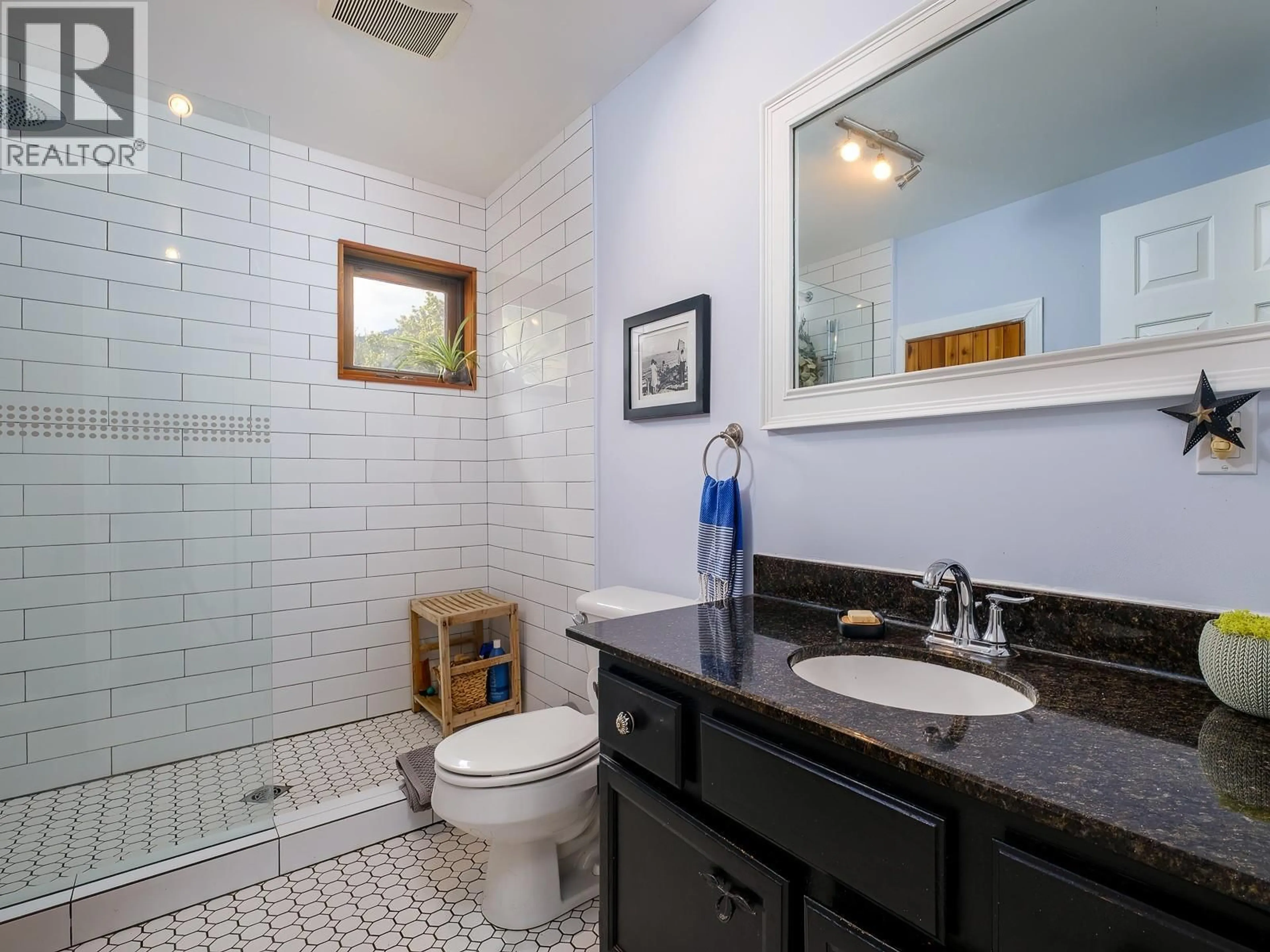 Standard bathroom, ceramic/tile floor for 1190 BLACK BEAR DRIVE, Rossland British Columbia V0G1Y0