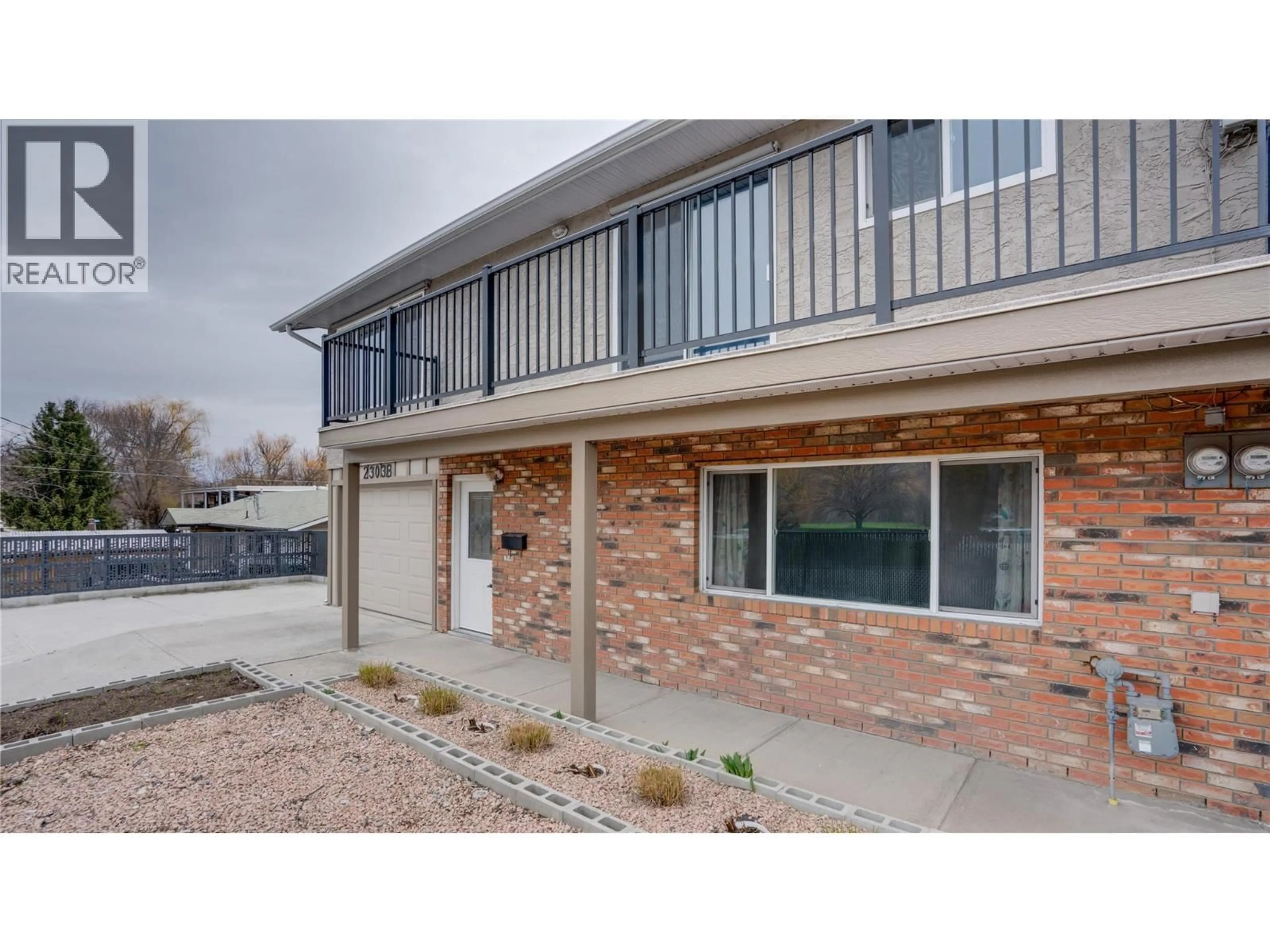 Home with brick exterior material, street for 2303B 39 STREET, Vernon British Columbia V1T7W9