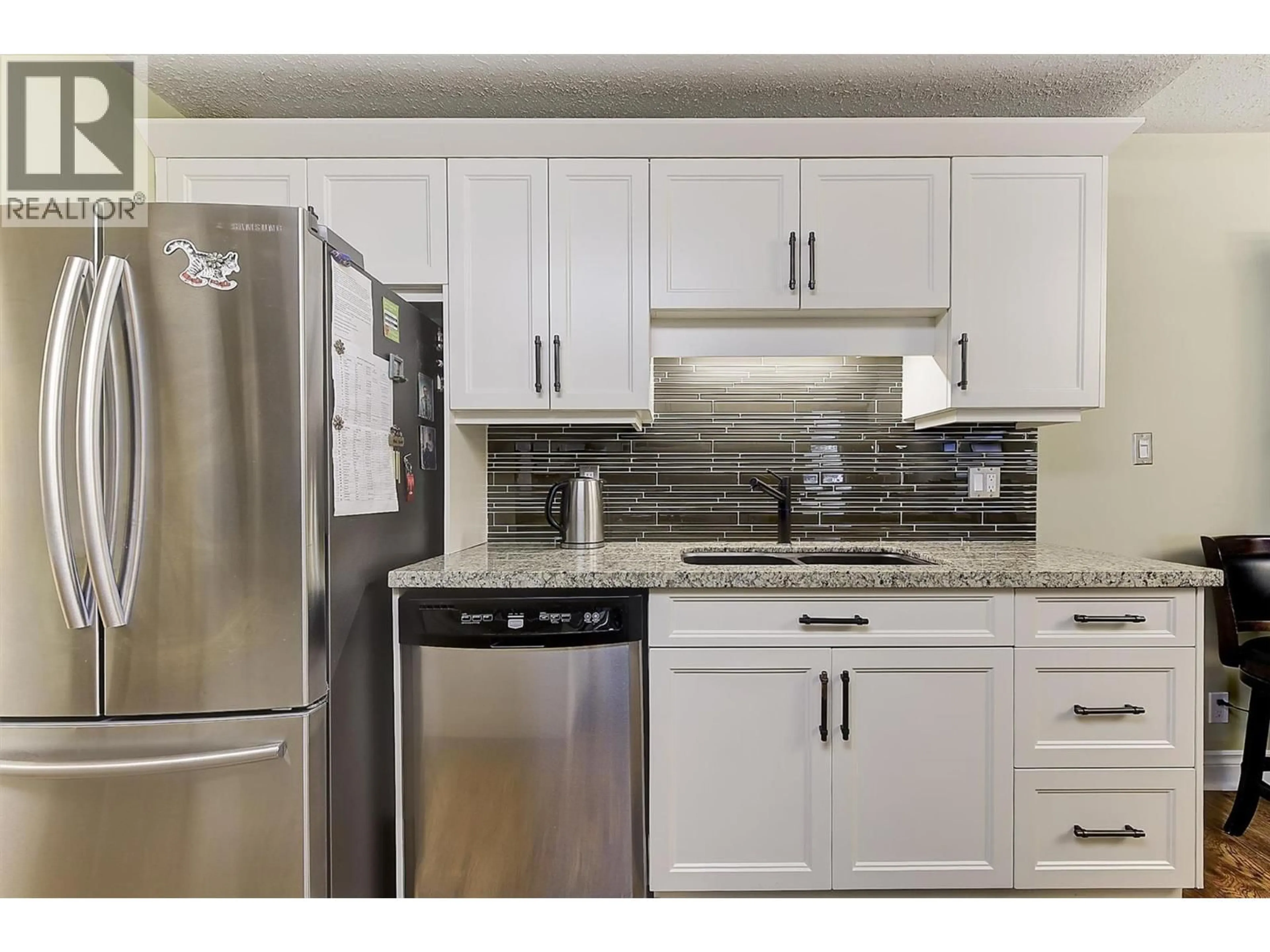 Standard kitchen, ceramic/tile floor for 103 - 2477 INGRAM ROAD, West Kelowna British Columbia V4T1W7