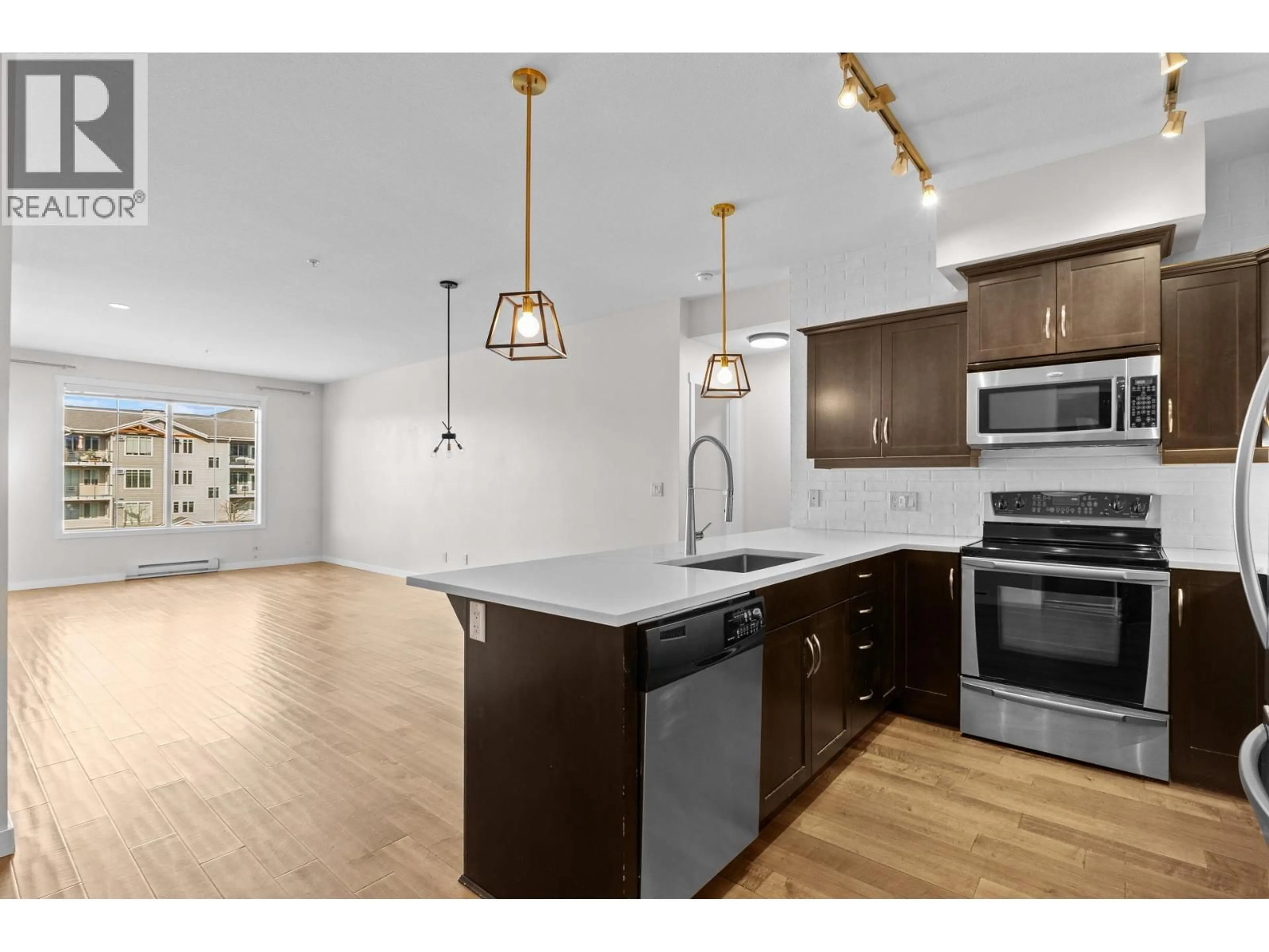Open concept kitchen, unknown for 302 - 3735 CASORSO ROAD, Kelowna British Columbia V1W5G1