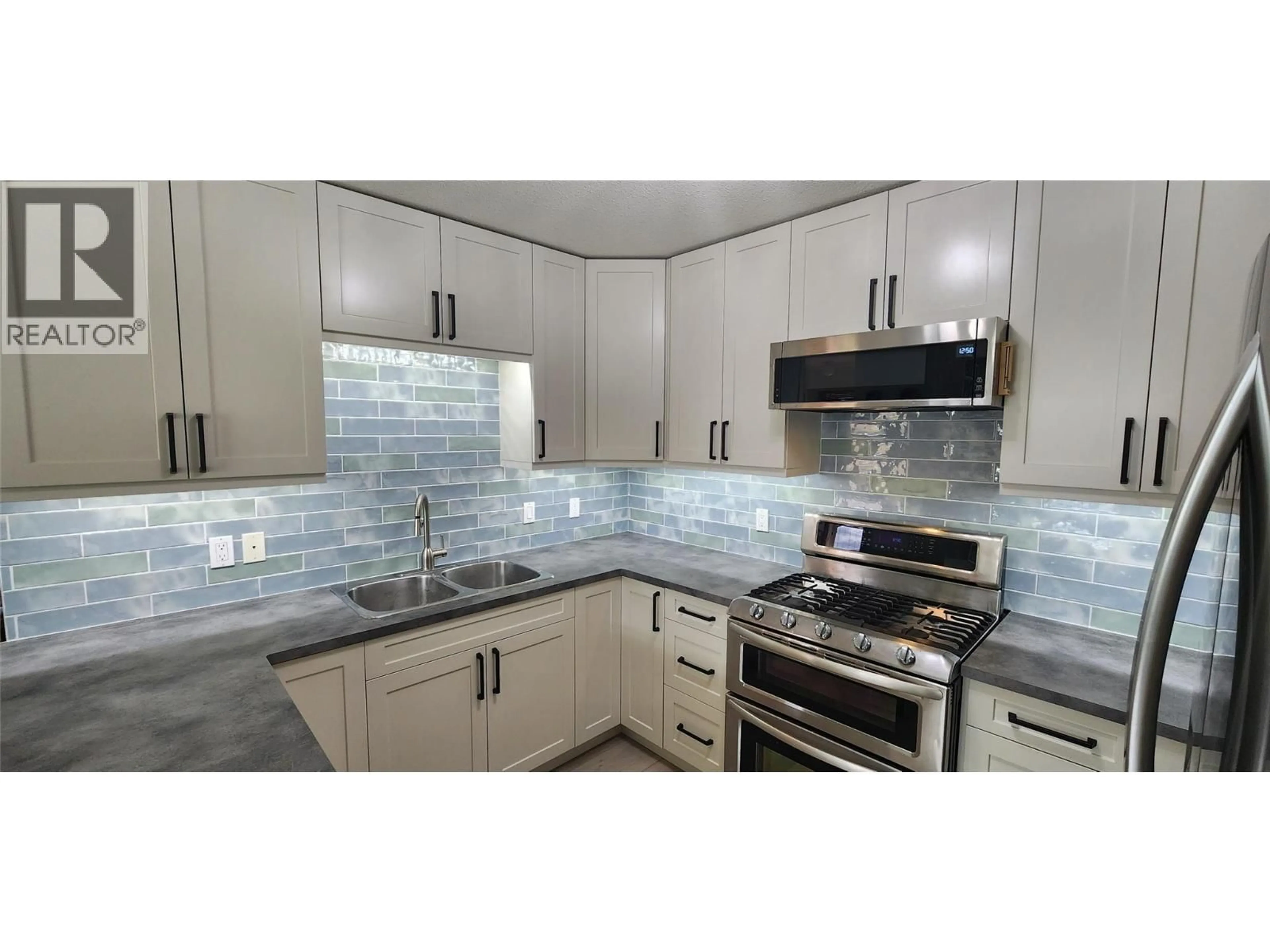 Contemporary kitchen, ceramic/tile floor for 7766 18TH STREET, Grand Forks British Columbia V0H1H2