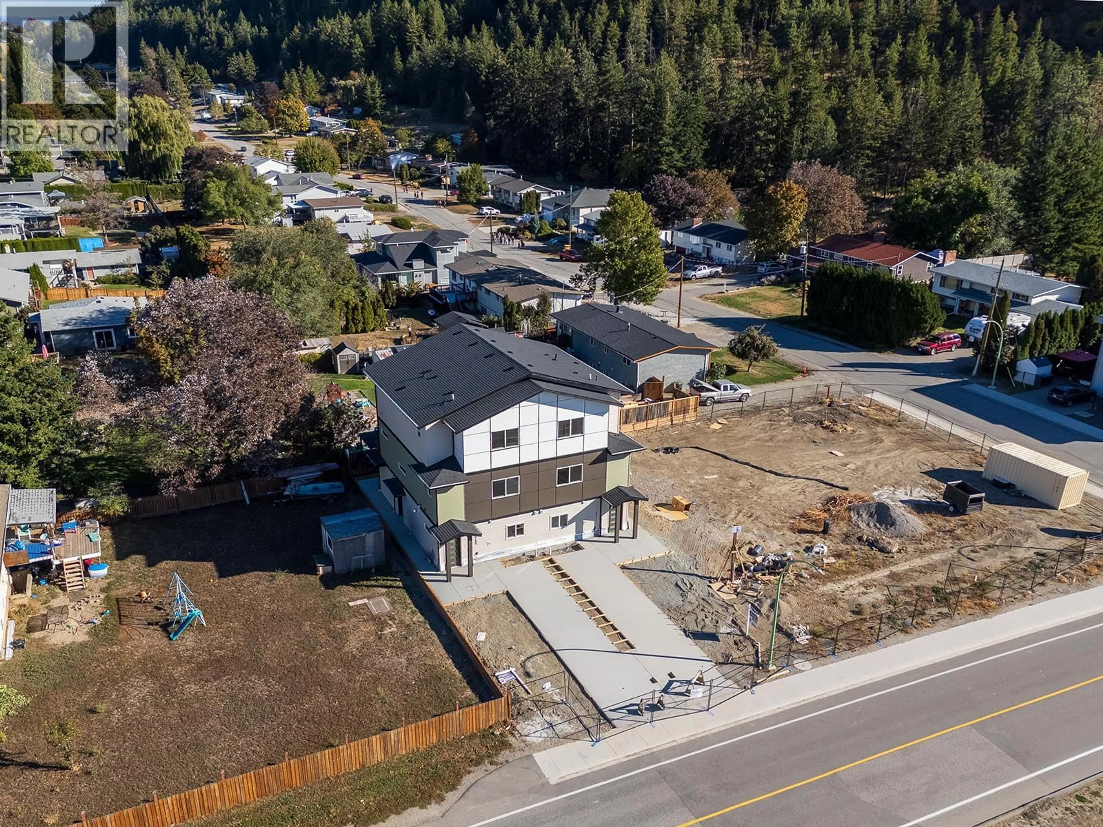 A pic from outside/outdoor area/front of a property/back of a property/a pic from drone, street for 2709 HEWL ROAD, West Kelowna British Columbia V1Z2M5