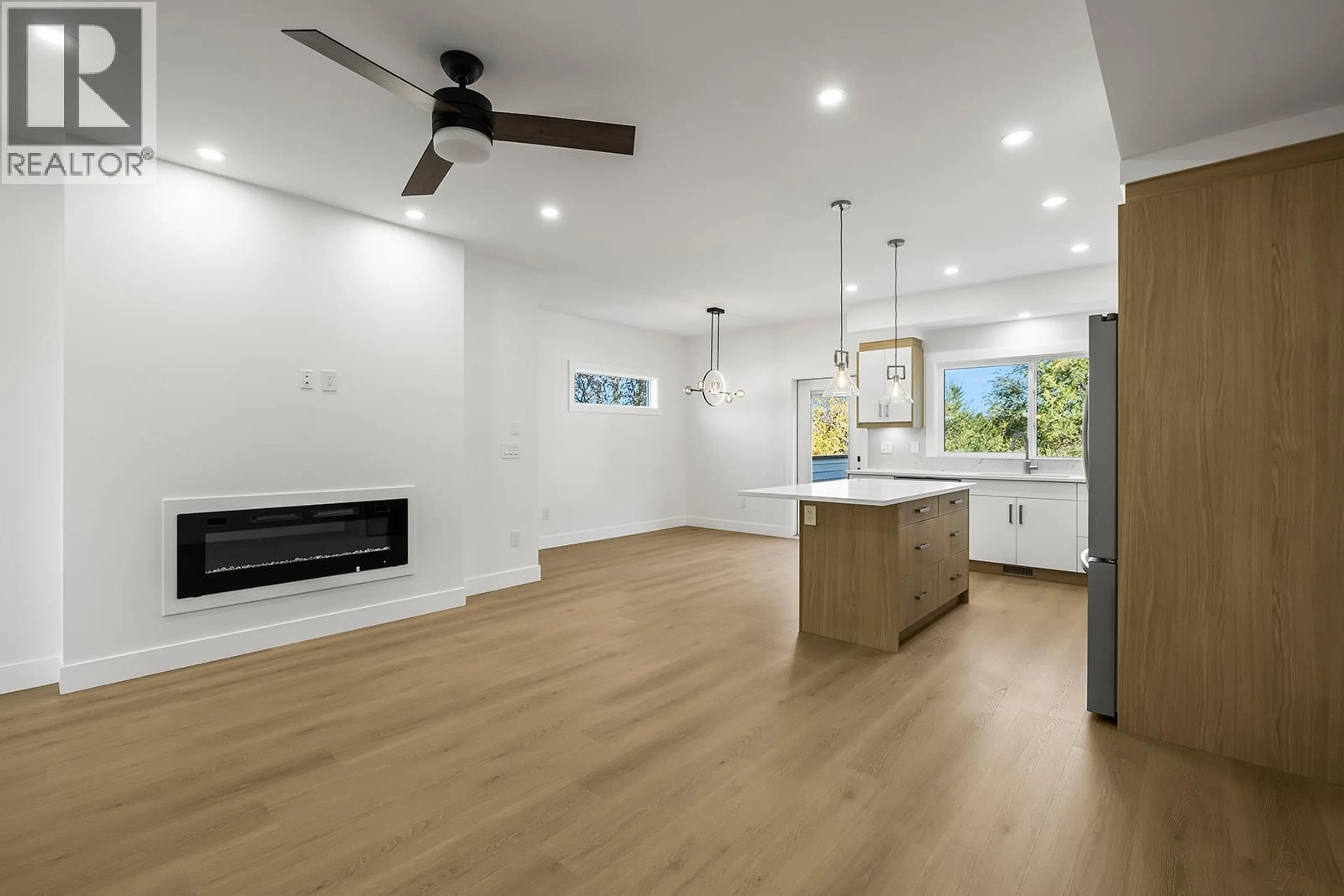 Open concept kitchen, wood/laminate floor for 2709 HEWL ROAD, West Kelowna British Columbia V1Z2M5