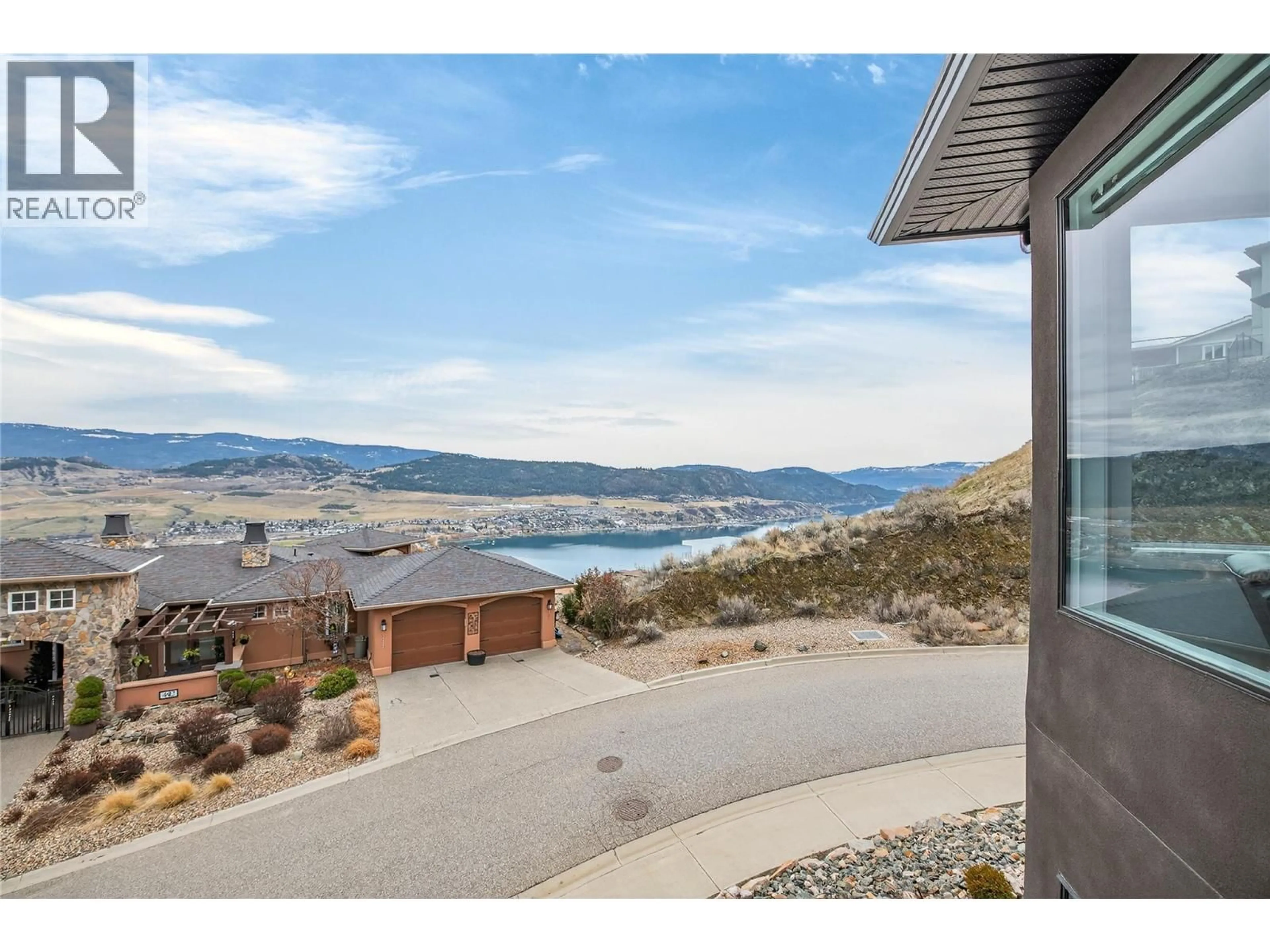 A pic from outside/outdoor area/front of a property/back of a property/a pic from drone, water/lake/river/ocean view for 1 - 496 SILVERSAGE PLACE, Vernon British Columbia V1H2J2