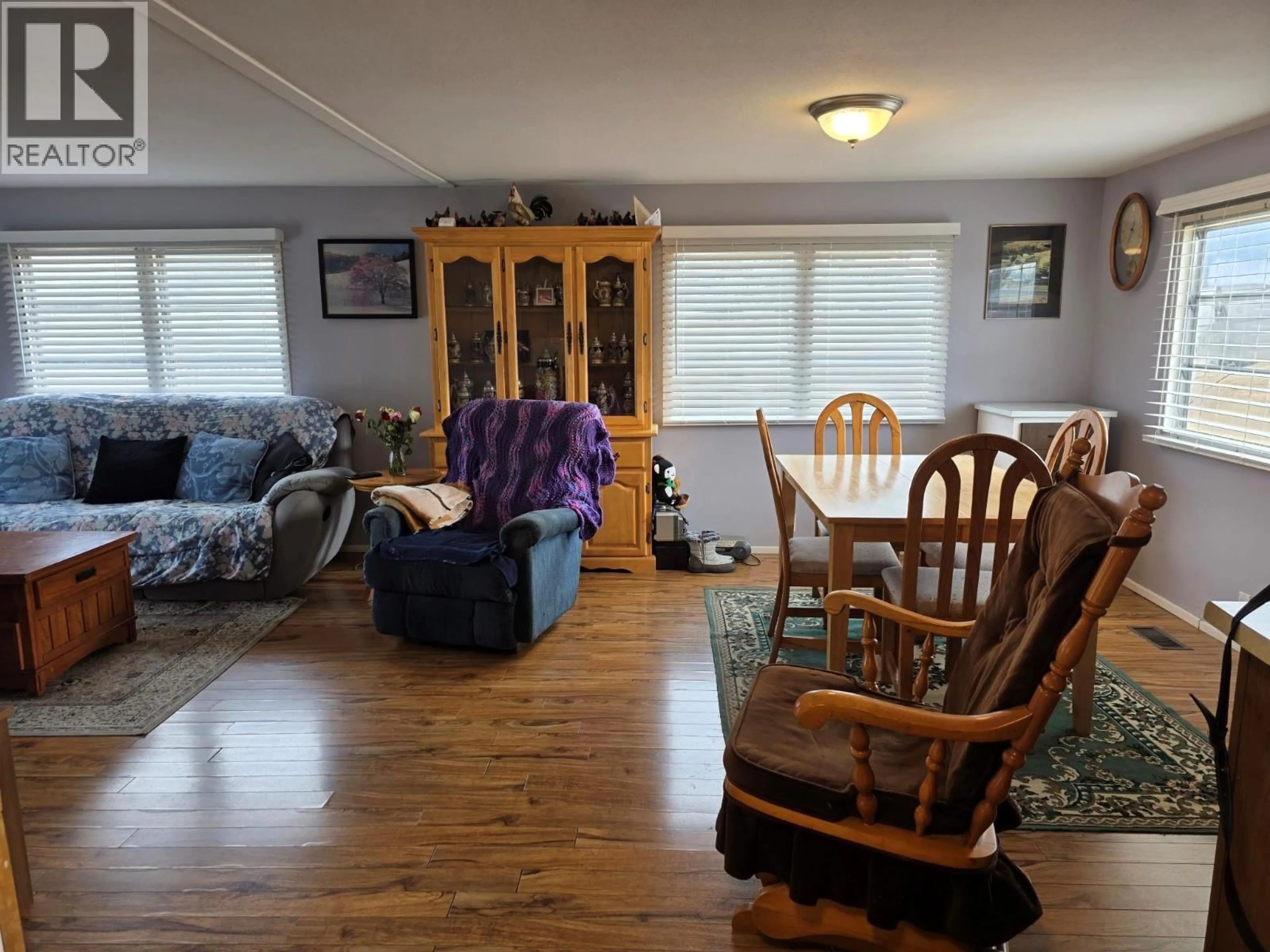 Living room with furniture, wood/laminate floor for 675 JASPER AVENUE, Grand Forks British Columbia V0H1H4