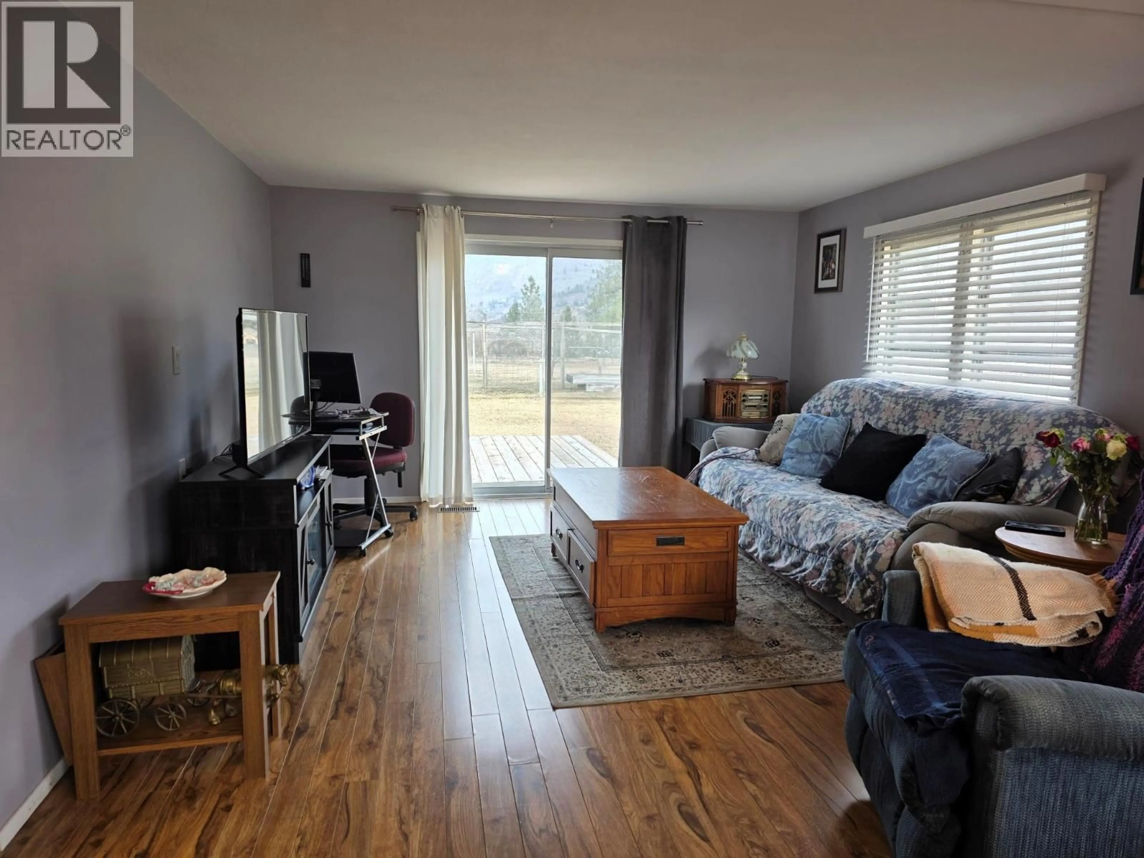 Living room with furniture, wood/laminate floor for 675 JASPER AVENUE, Grand Forks British Columbia V0H1H4