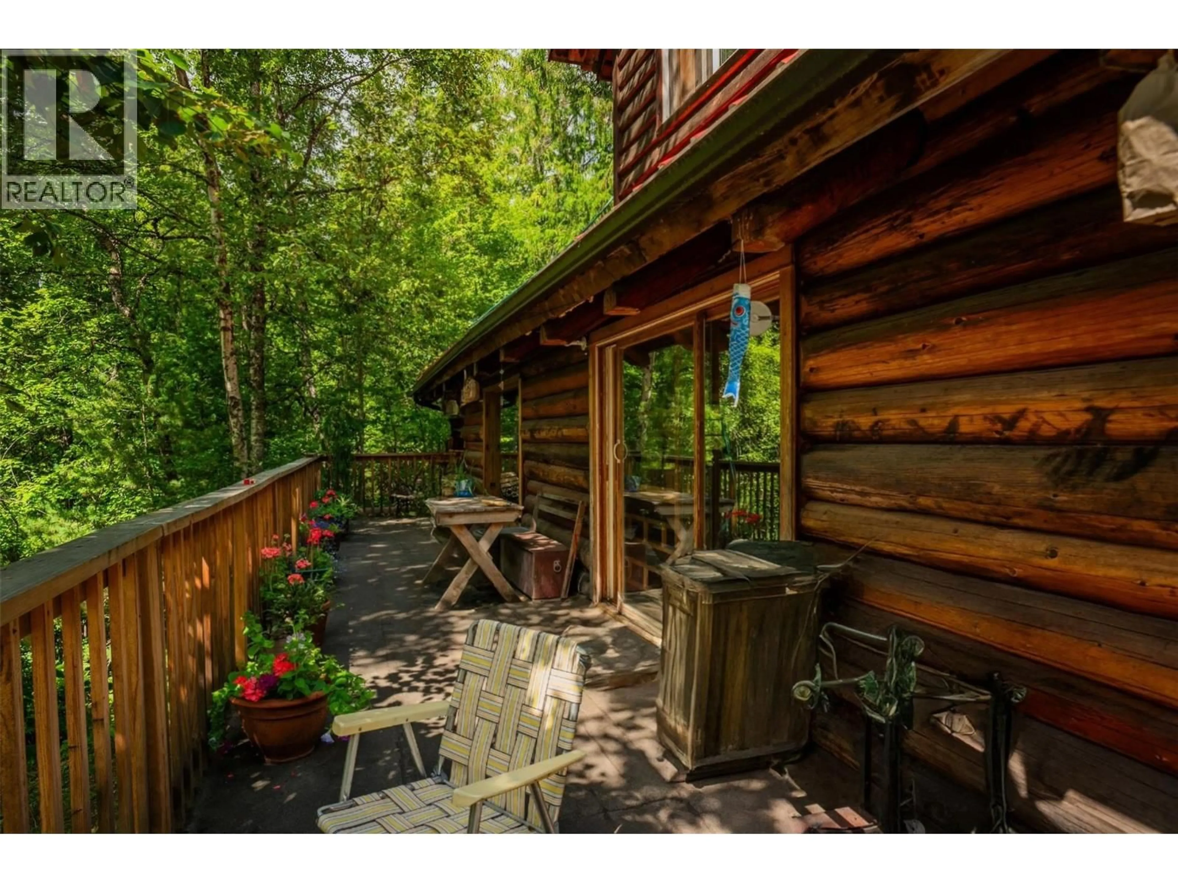 Patio, forest/trees view for 1506 HIGHWAY 31A OTHER, New Denver British Columbia V0G1S0