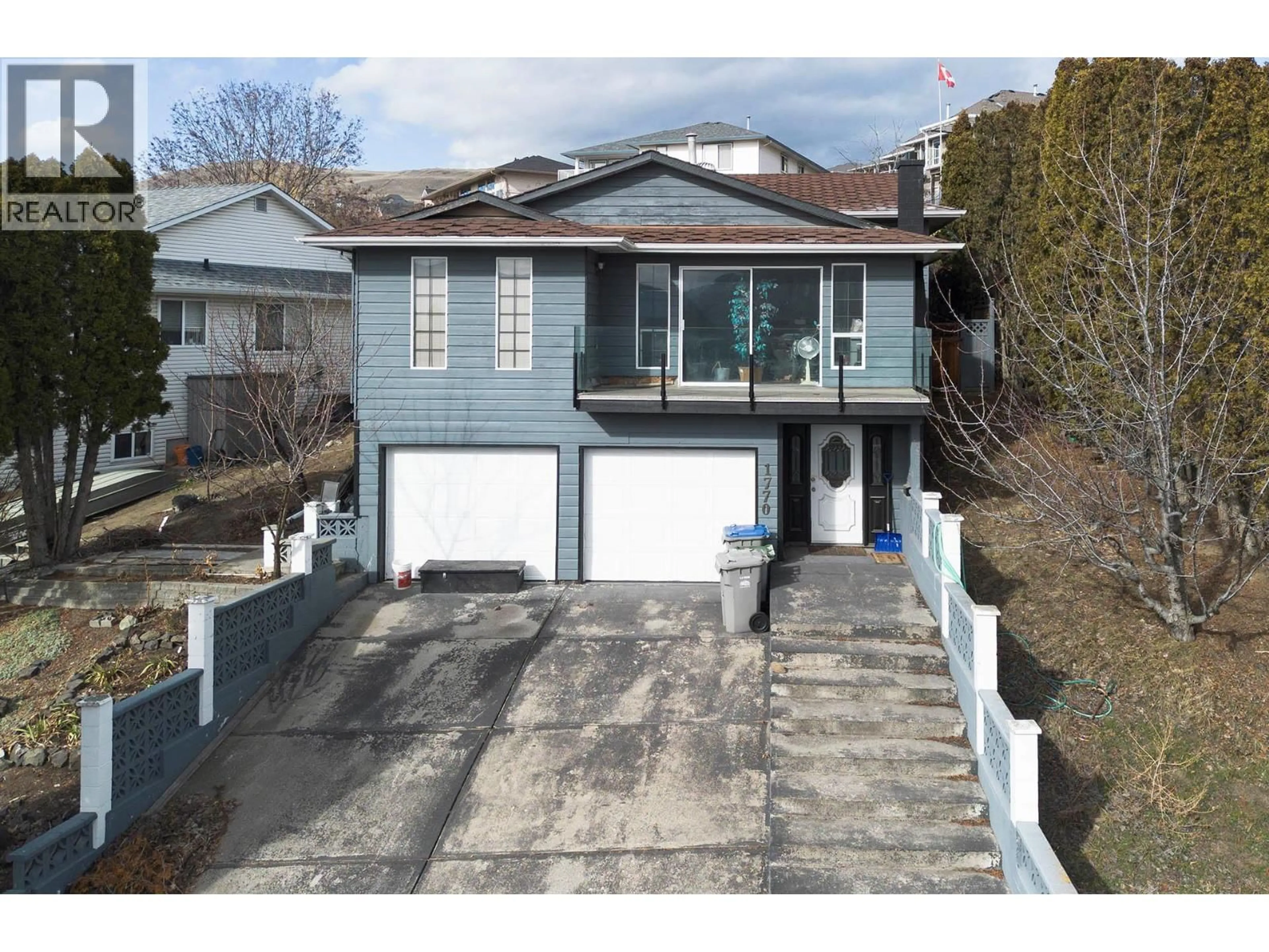 A pic from outside/outdoor area/front of a property/back of a property/a pic from drone, street for 1770 NORTH RIVER DRIVE, Kamloops British Columbia V2B7N7