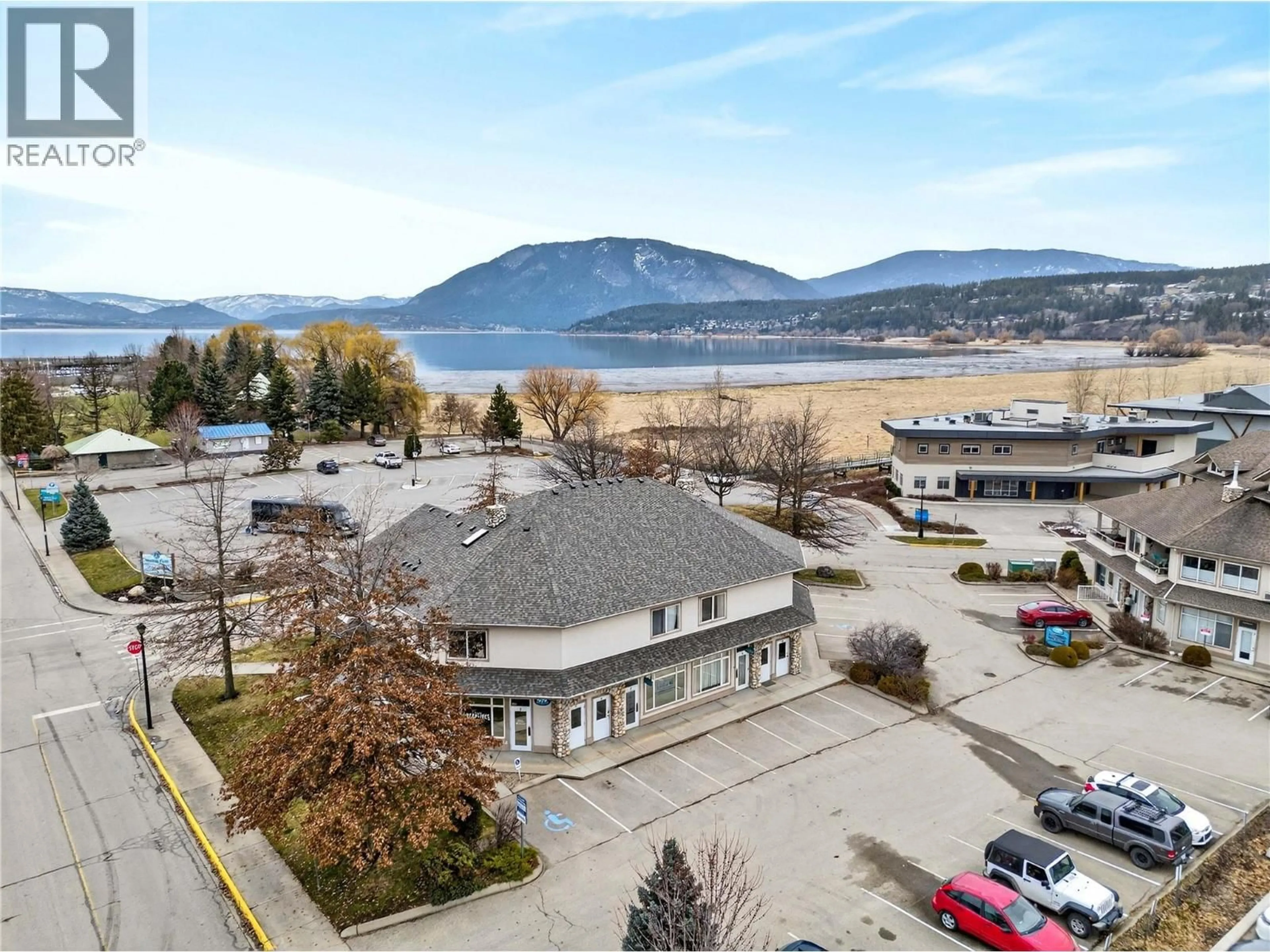 A pic from outside/outdoor area/front of a property/back of a property/a pic from drone, water/lake/river/ocean view for 1 - 680 MARINE PARK DRIVE, Salmon Arm British Columbia V1E3L4