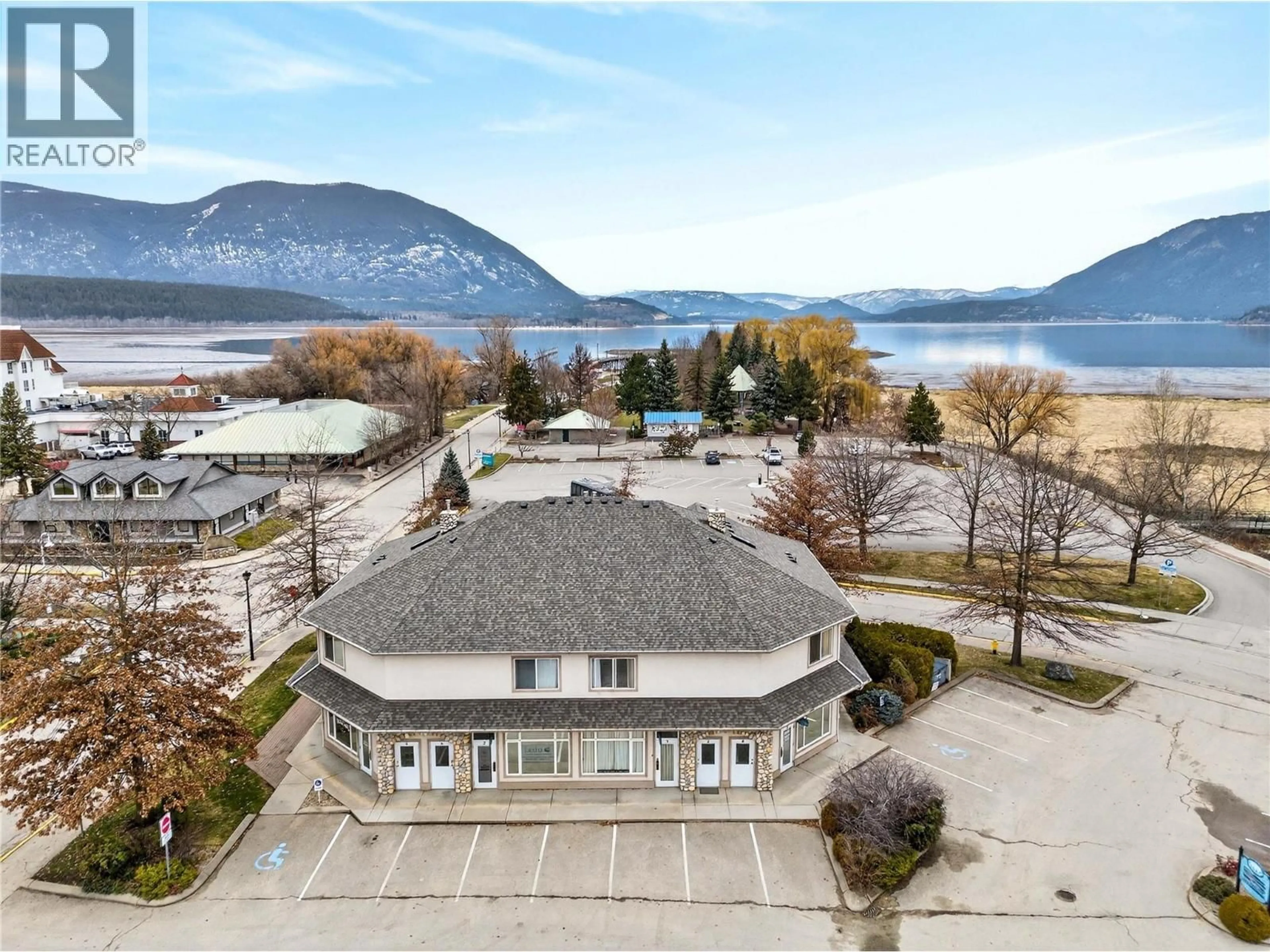 A pic from outside/outdoor area/front of a property/back of a property/a pic from drone, water/lake/river/ocean view for 1 - 680 MARINE PARK DRIVE, Salmon Arm British Columbia V1E3L4