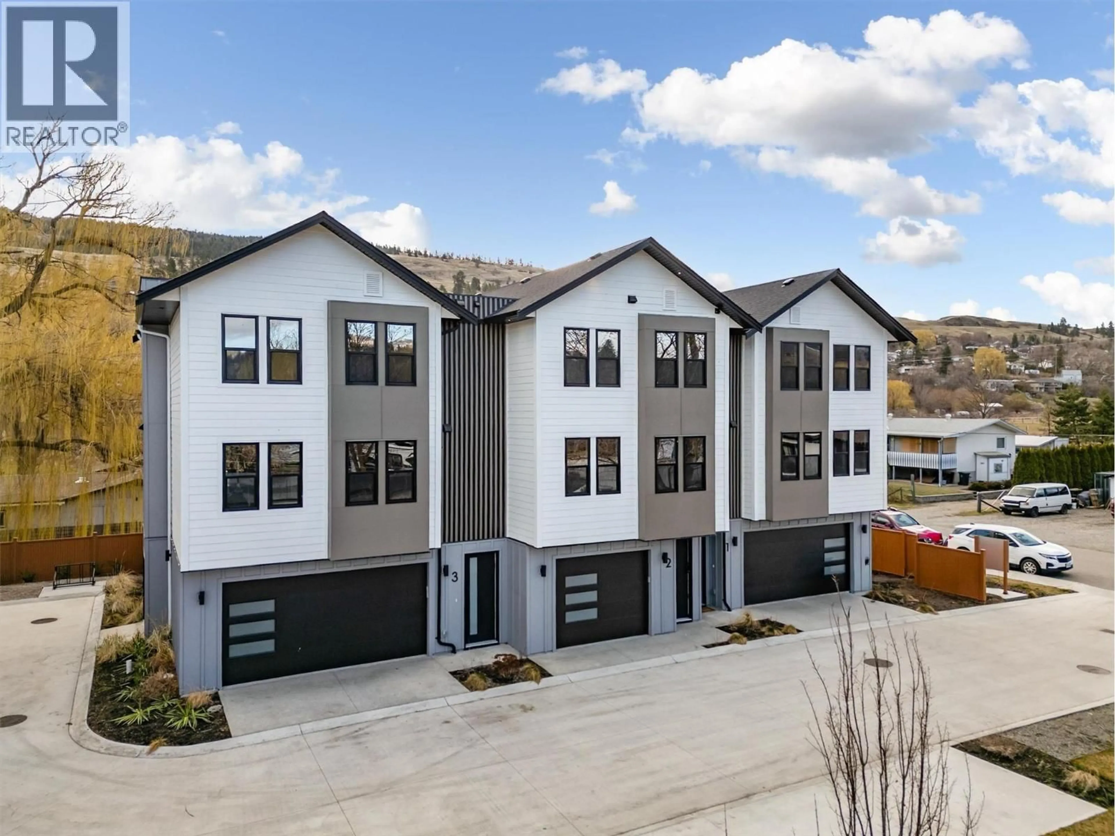 A pic from outside/outdoor area/front of a property/back of a property/a pic from drone, street for 2 - 3590 REDECOPP ROAD, Lake Country British Columbia V4V1X5