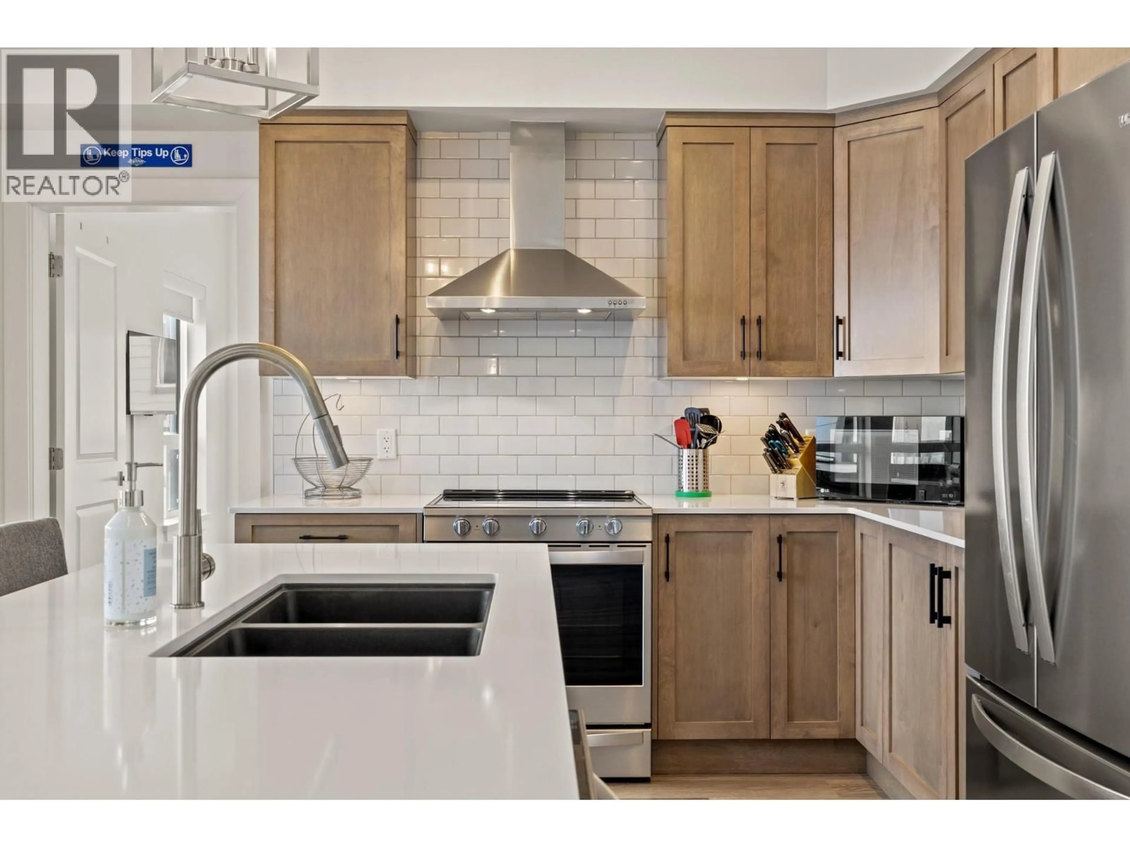 Contemporary kitchen, ceramic/tile floor for 1B - 5075 SNOWBIRD WAY, Big White British Columbia V1P1P3