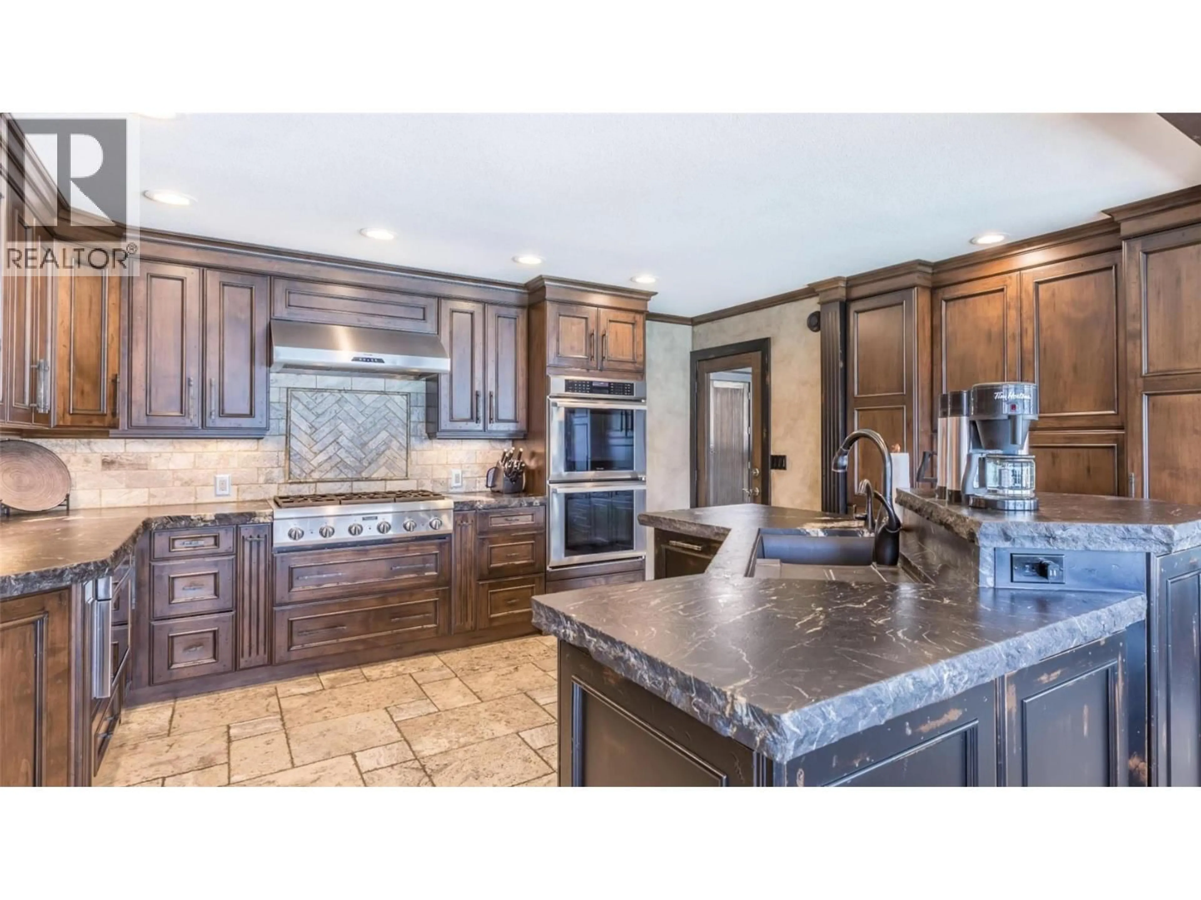 Open concept kitchen, ceramic/tile floor for 15010 & 15020 TAMARACK DRIVE, Coldstream British Columbia V1B2E1