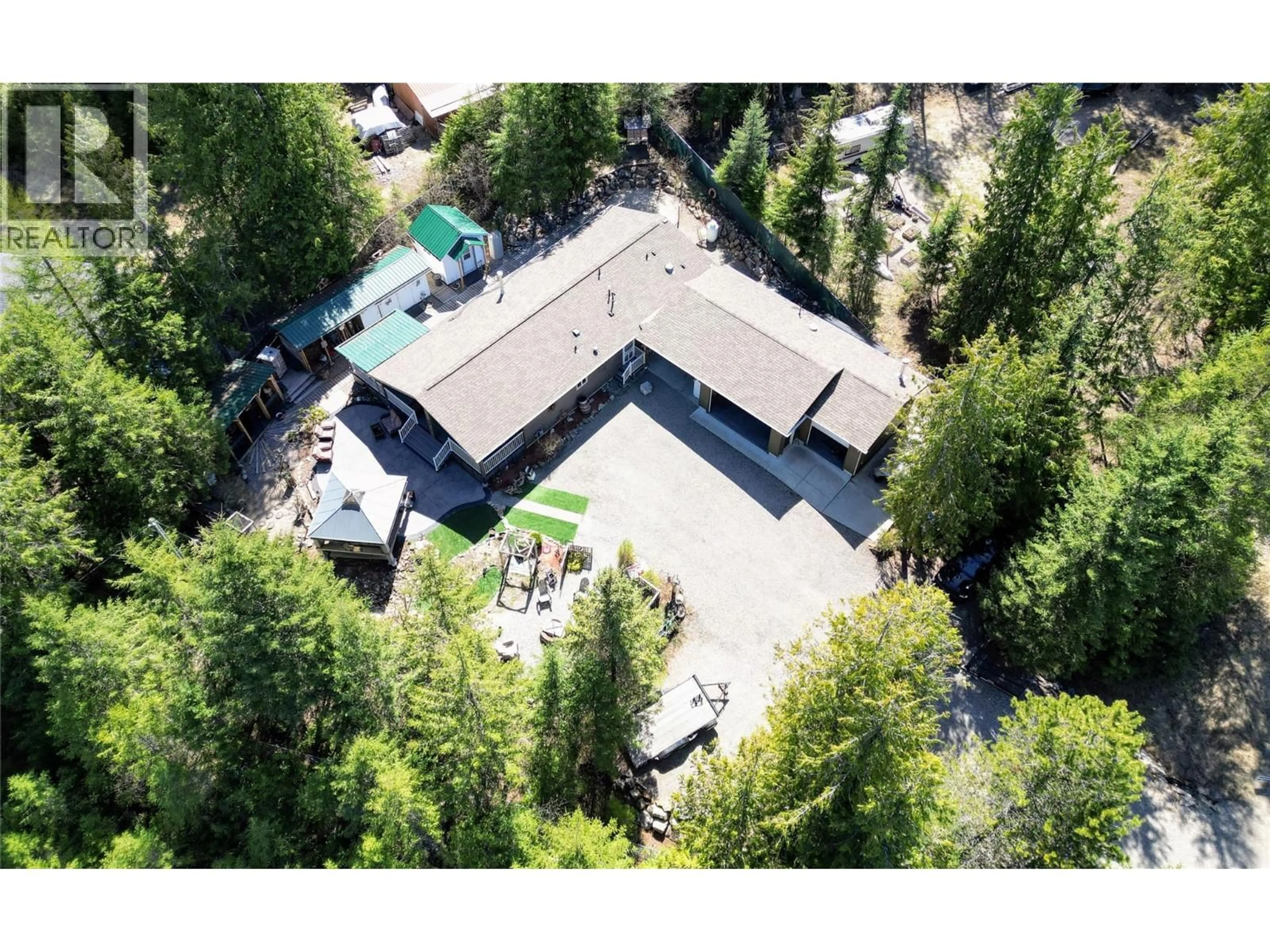 A pic from outside/outdoor area/front of a property/back of a property/a pic from drone, unknown for 1601 BEECH ROAD, Christina Lake British Columbia V0H1E0