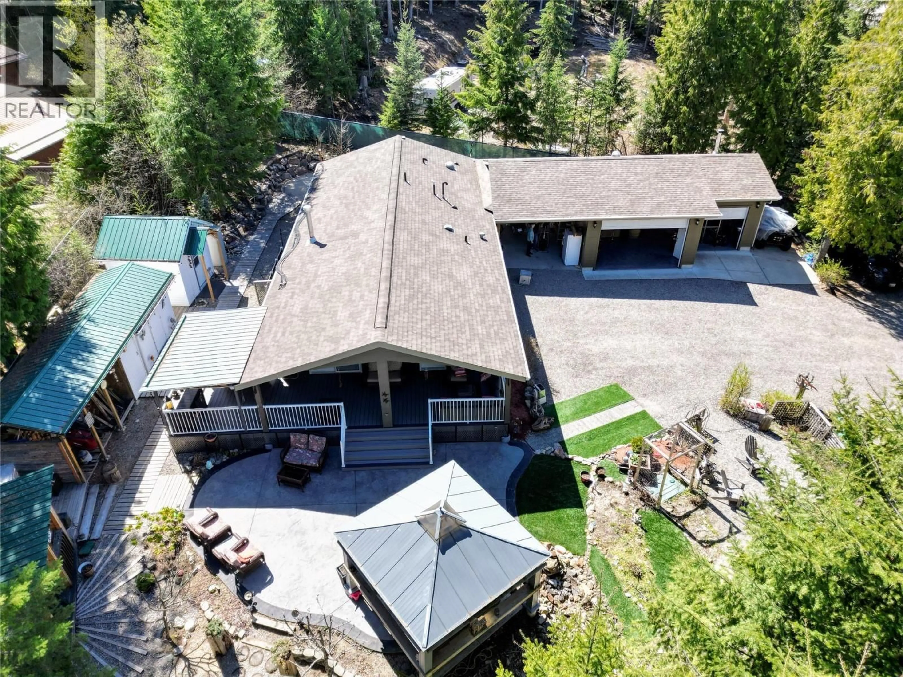A pic from outside/outdoor area/front of a property/back of a property/a pic from drone, mountain view for 1601 BEECH ROAD, Christina Lake British Columbia V0H1E0