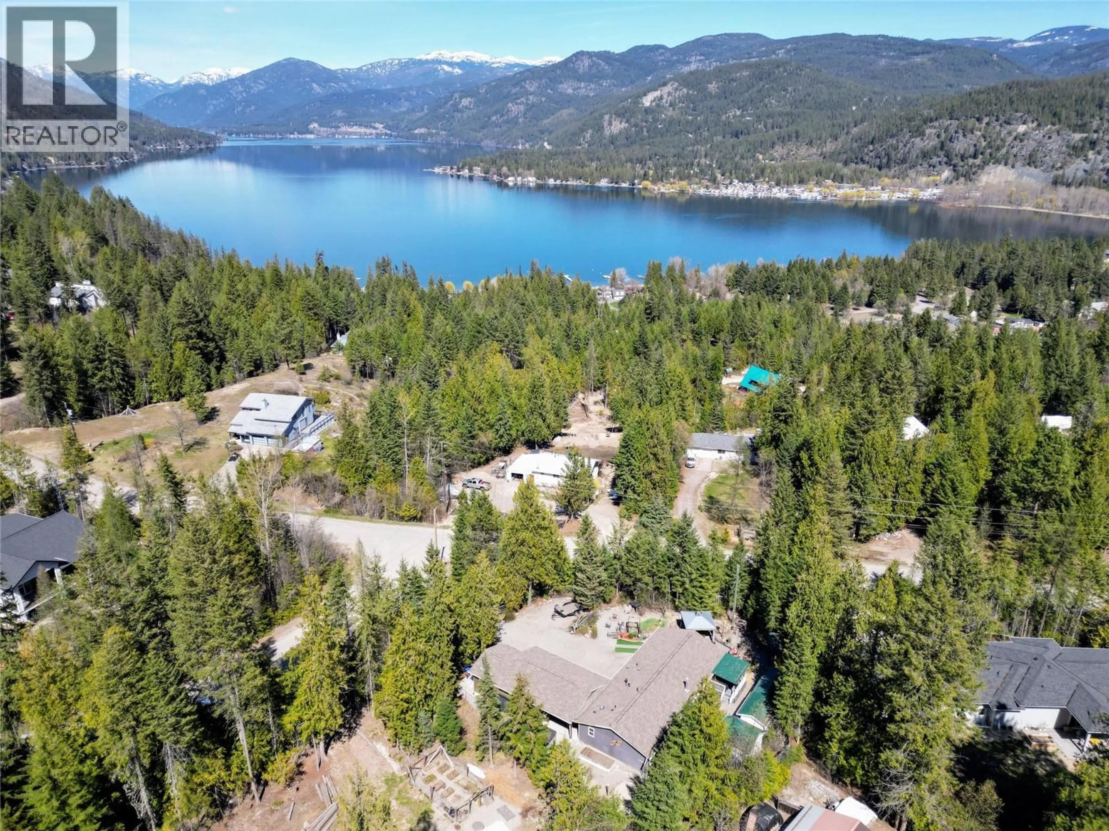 A pic from outside/outdoor area/front of a property/back of a property/a pic from drone, water/lake/river/ocean view for 1601 BEECH ROAD, Christina Lake British Columbia V0H1E0