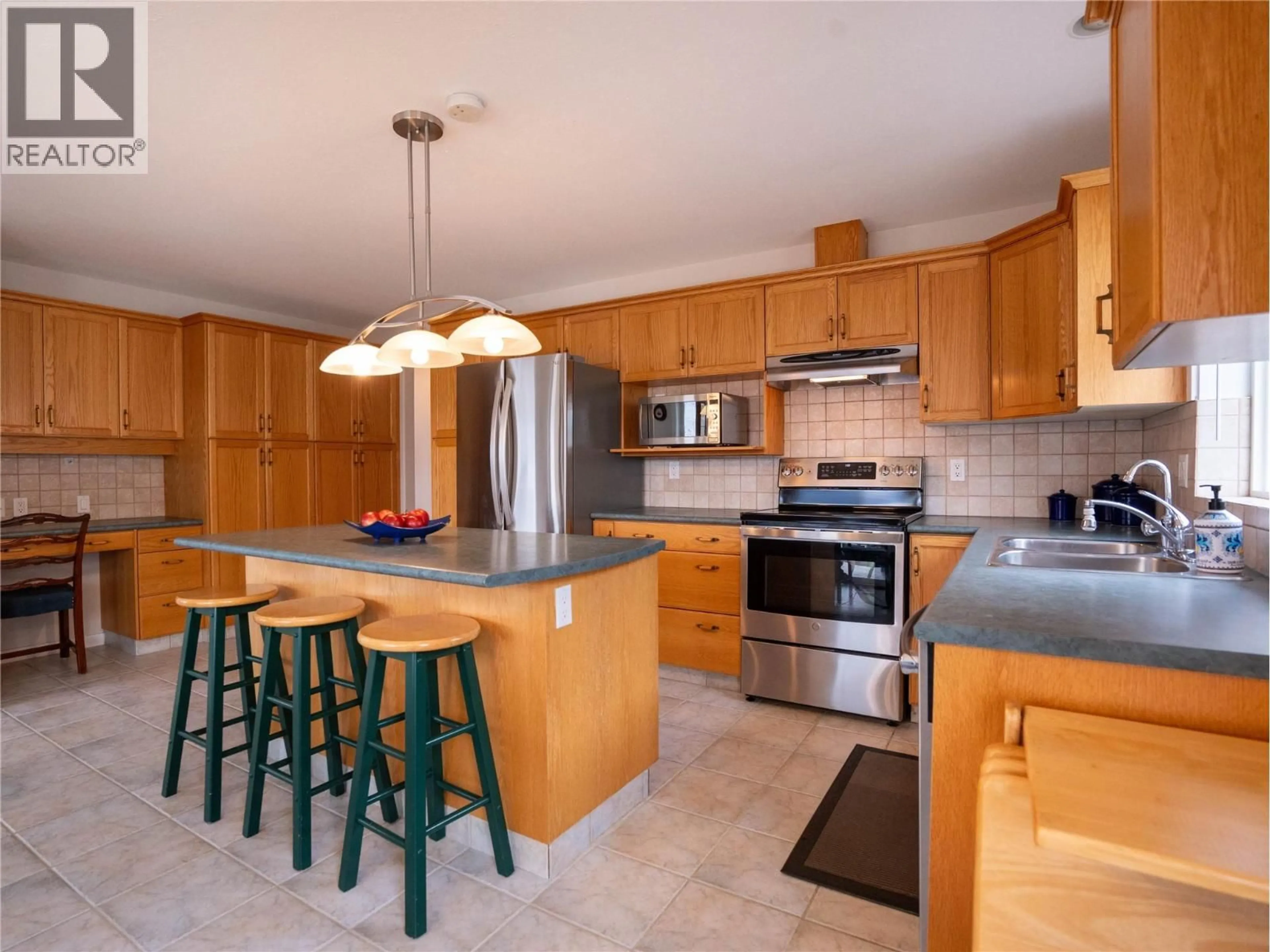 Open concept kitchen, unknown for 11714 QUAIL RIDGE PLACE, Osoyoos British Columbia V0H1V4