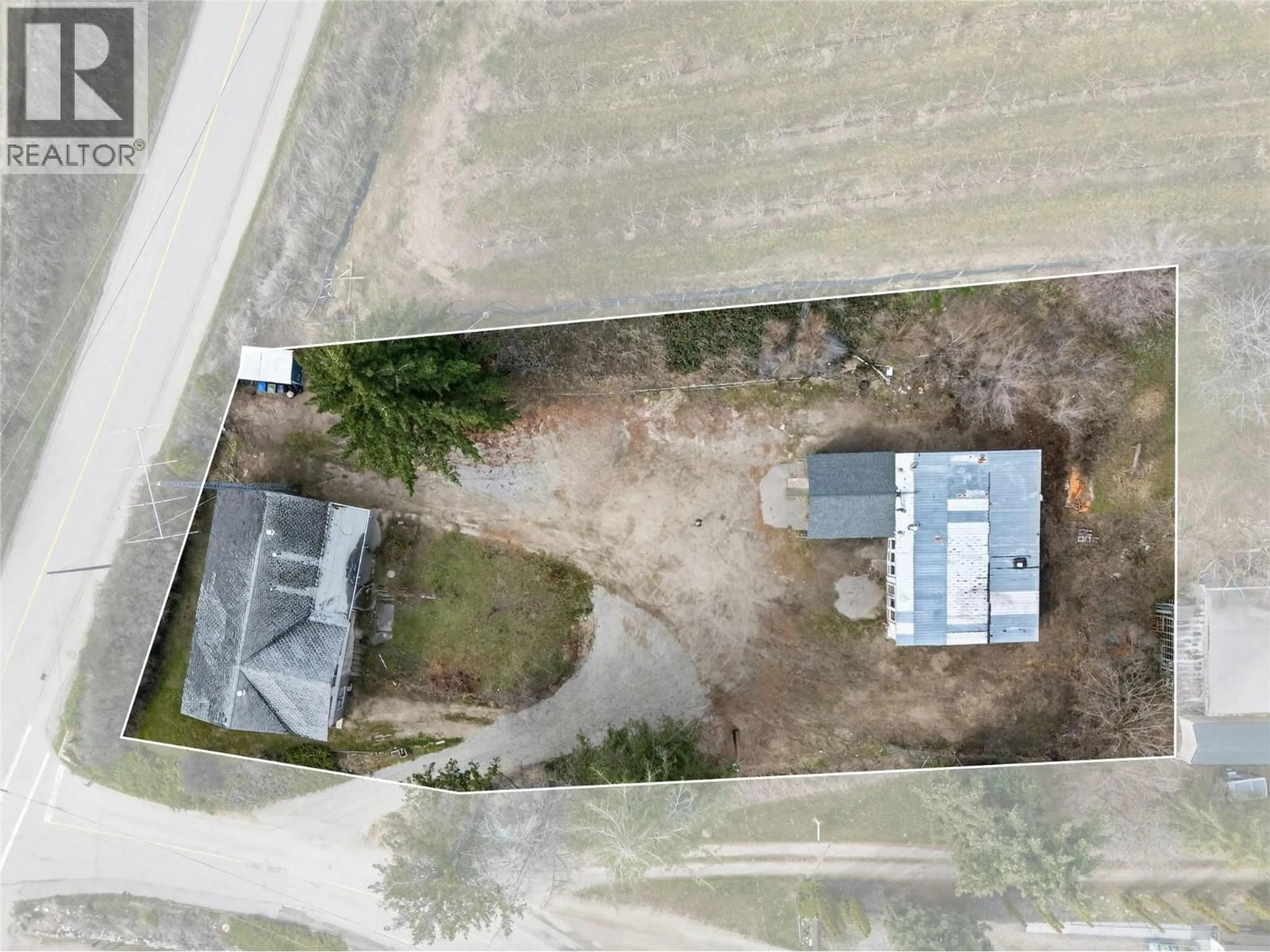 A pic from outside/outdoor area/front of a property/back of a property/a pic from drone, street for 10114 NEWENE ROAD, Lake Country British Columbia V4V1V2