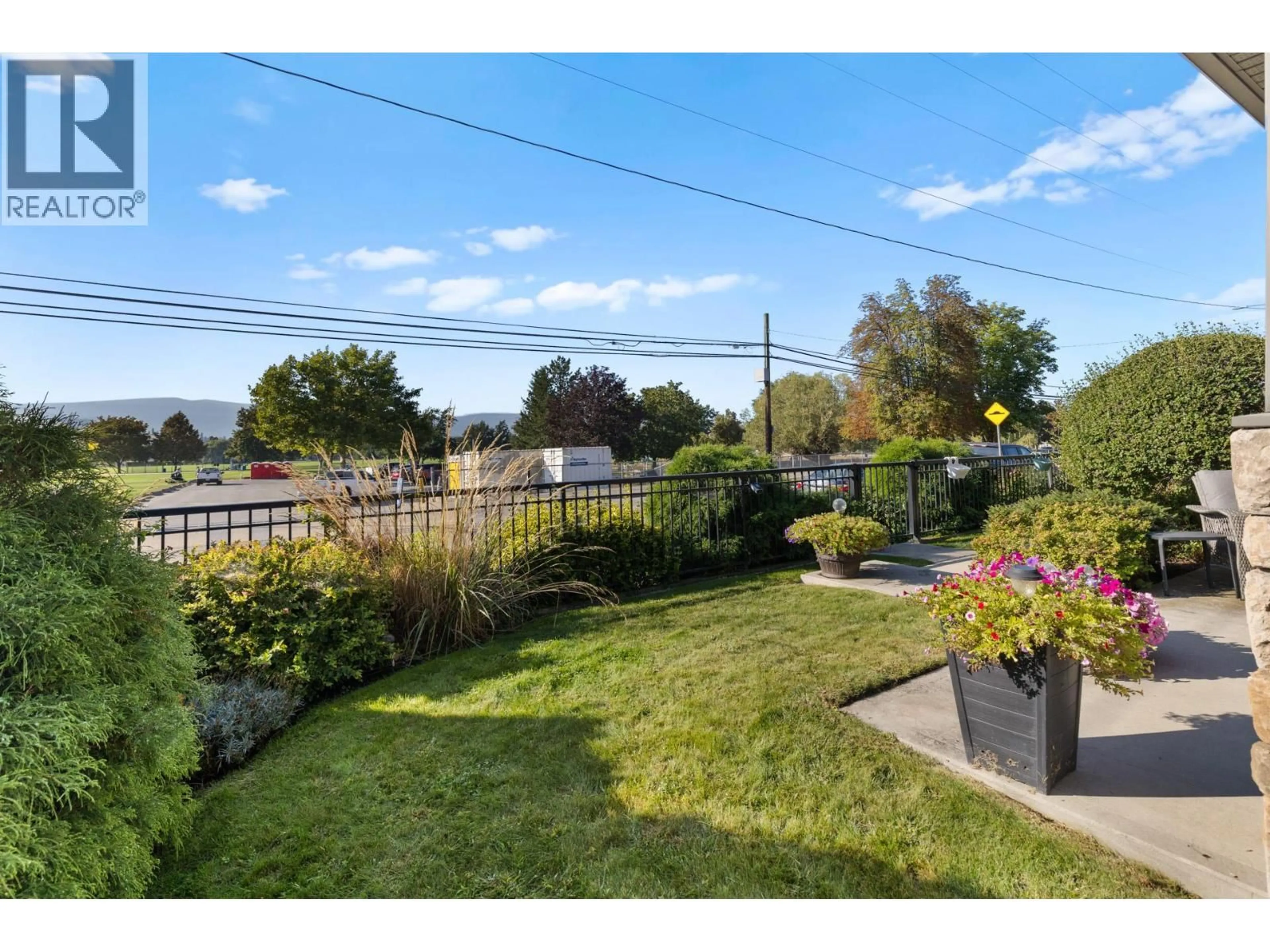 A pic from outside/outdoor area/front of a property/back of a property/a pic from drone, unknown for 112 - 440 HARTMAN ROAD, Kelowna British Columbia V1X2N1