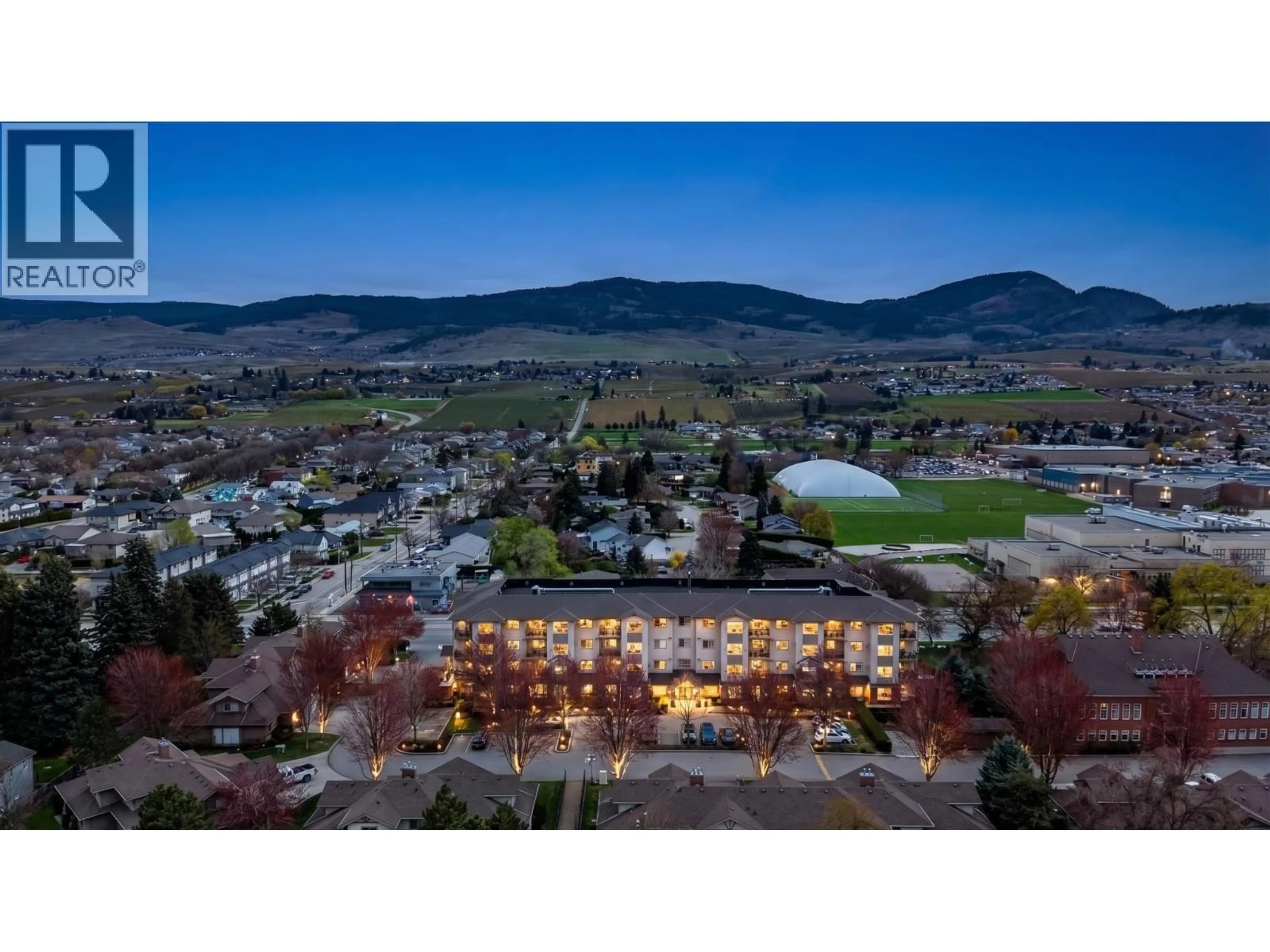 A pic from outside/outdoor area/front of a property/back of a property/a pic from drone, mountain view for 408 - 778 RUTLAND ROAD, Kelowna British Columbia V1X8B3