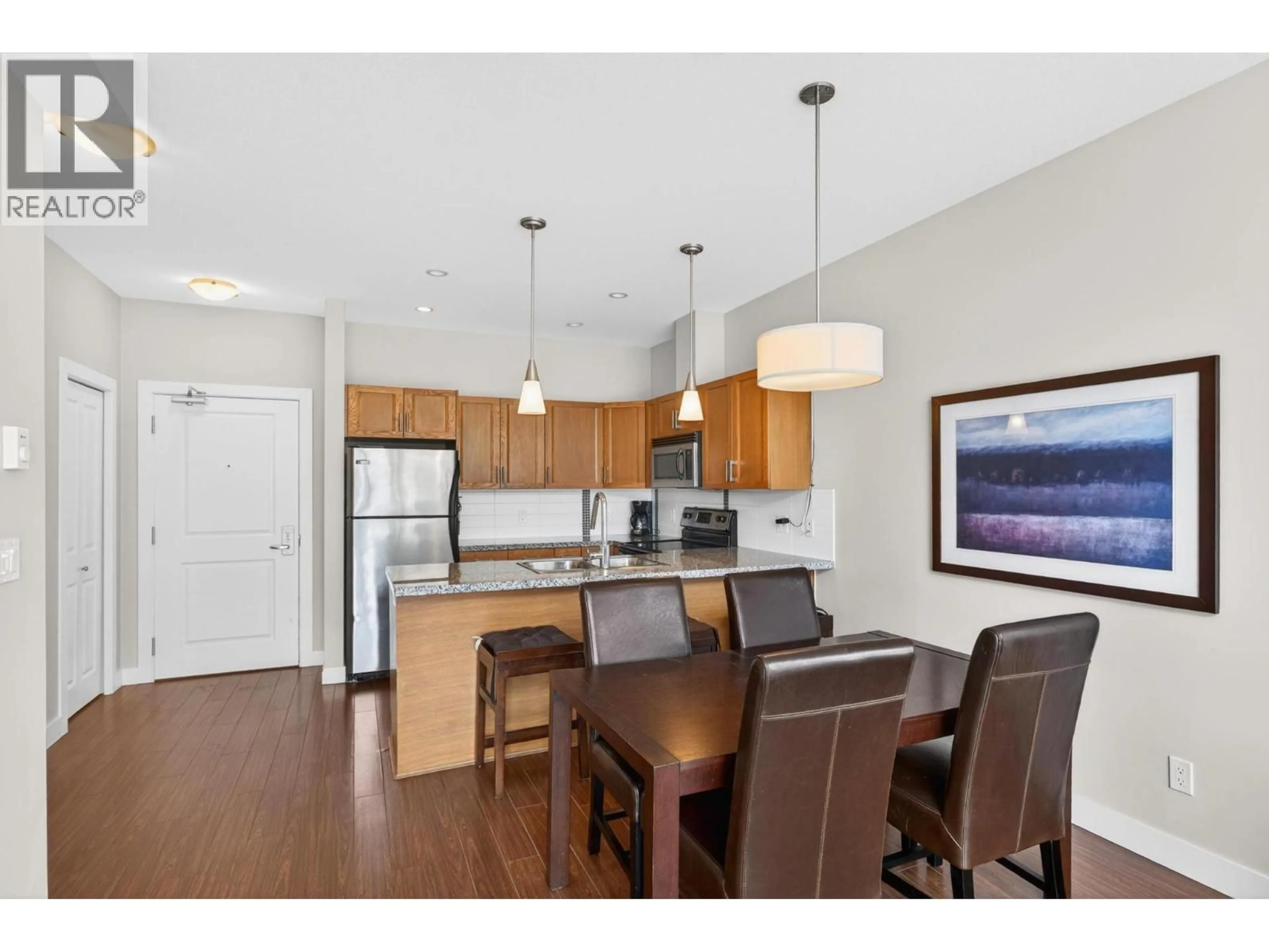 Open concept kitchen, wood/laminate floor for 508 - 3205 SKYVIEW LANE, West Kelowna British Columbia V4T3J3