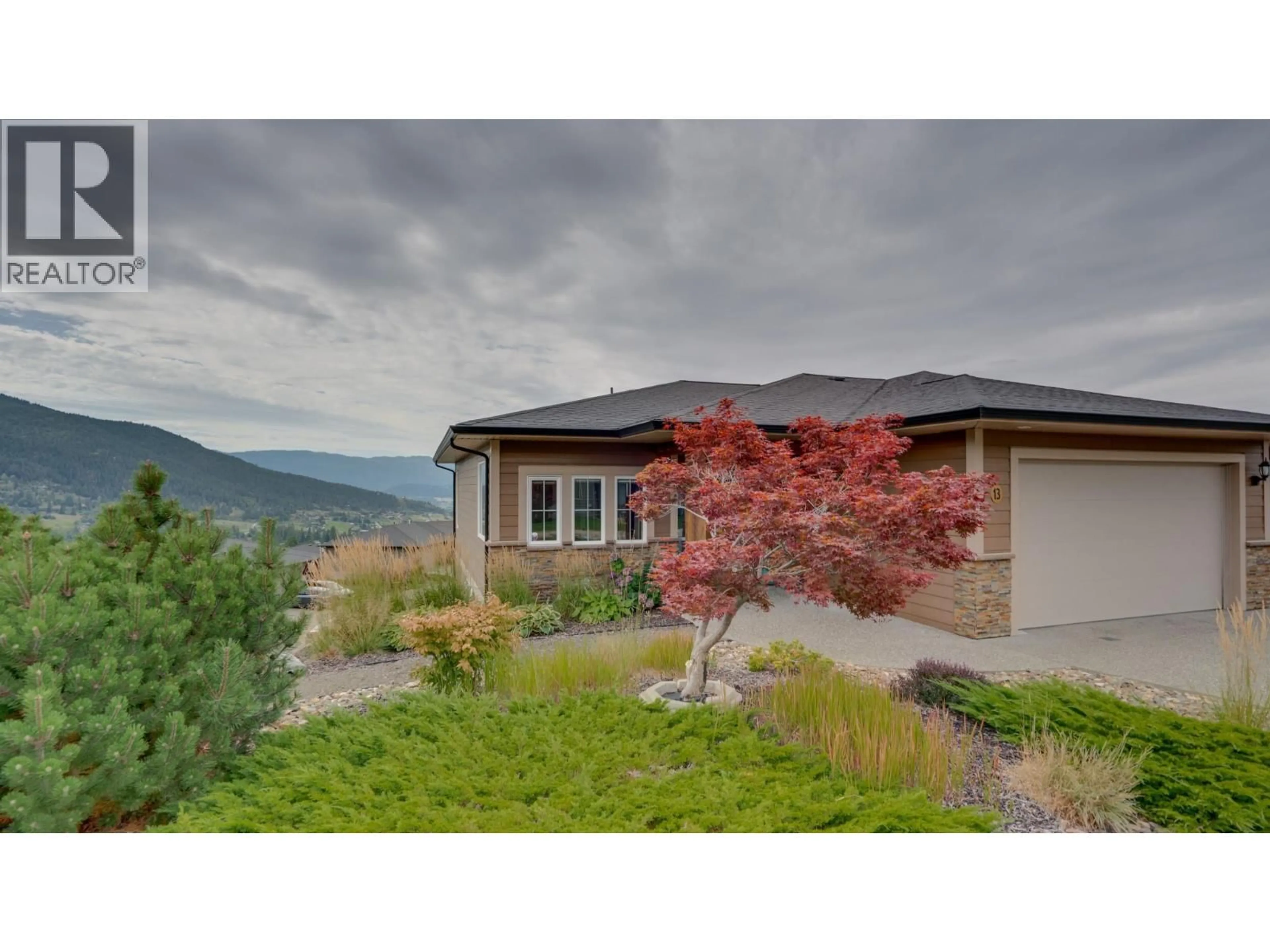 Home with vinyl exterior material, mountain view for 13 - 1404 COPPER MOUNTAIN COURT, Vernon British Columbia V1B4E2