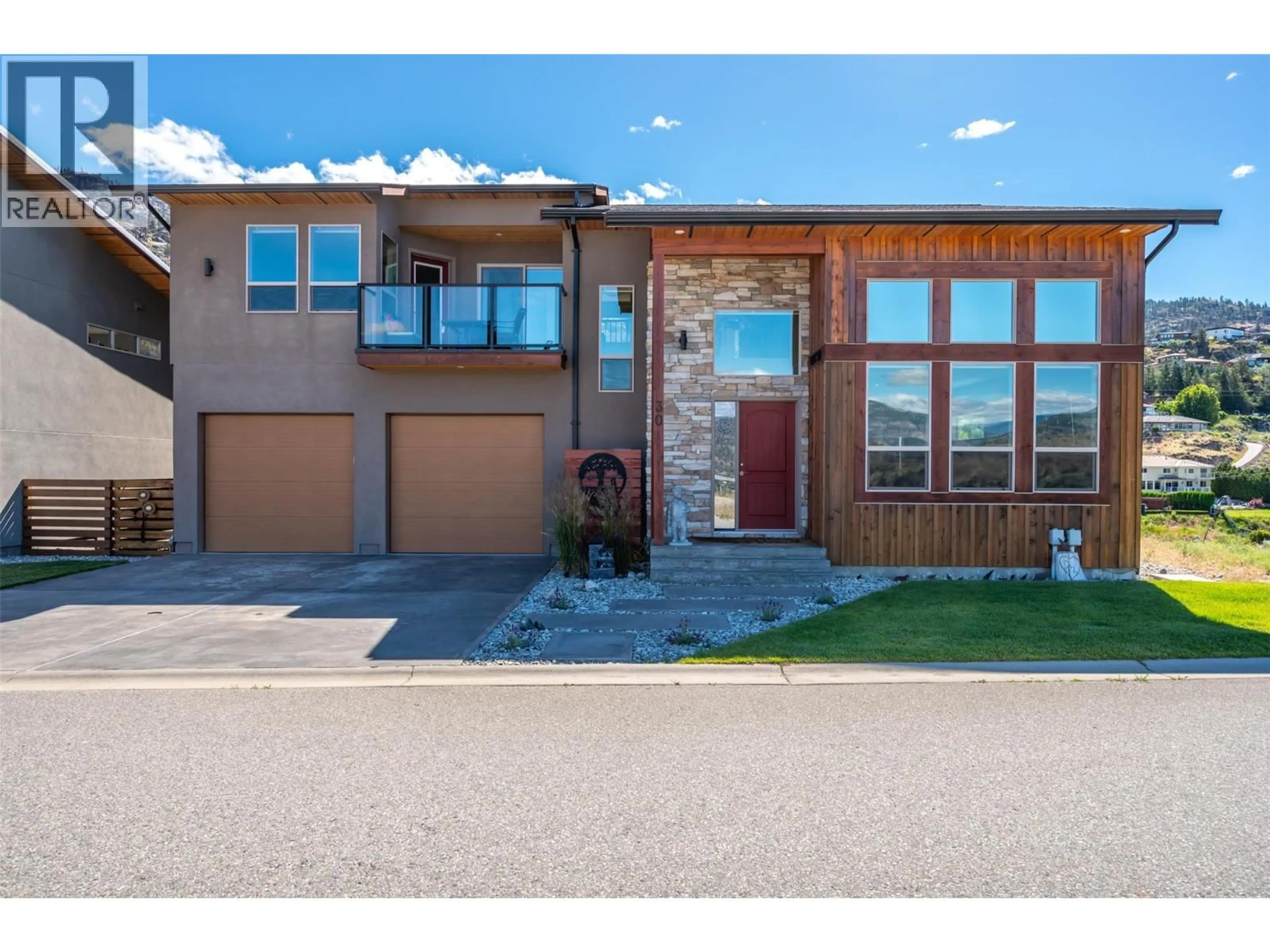 Home with brick exterior material, street for 30 - 125 CABERNET DRIVE, Okanagan Falls British Columbia V0H1R3