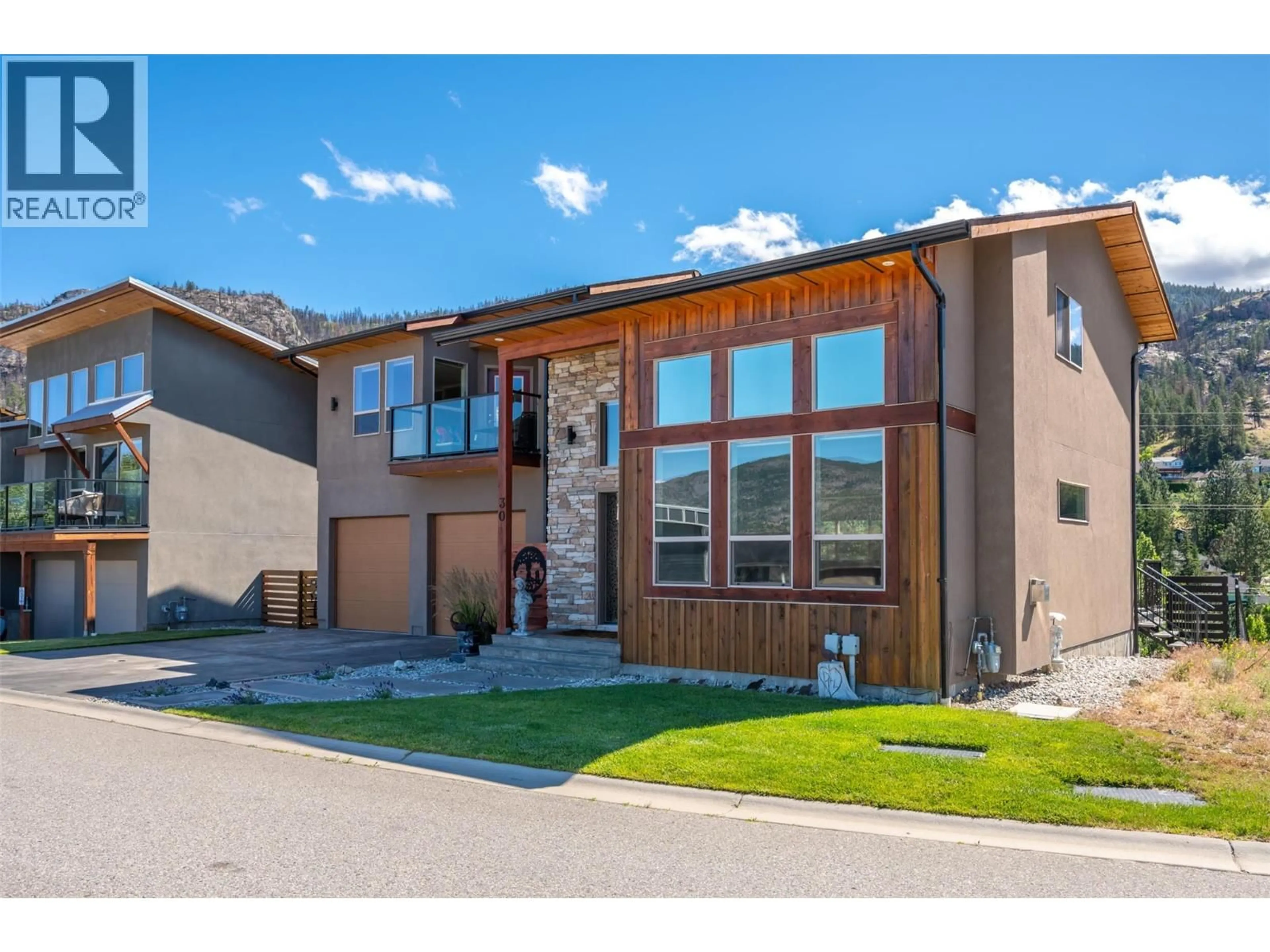 Home with brick exterior material, street for 30 - 125 CABERNET DRIVE, Okanagan Falls British Columbia V0H1R3