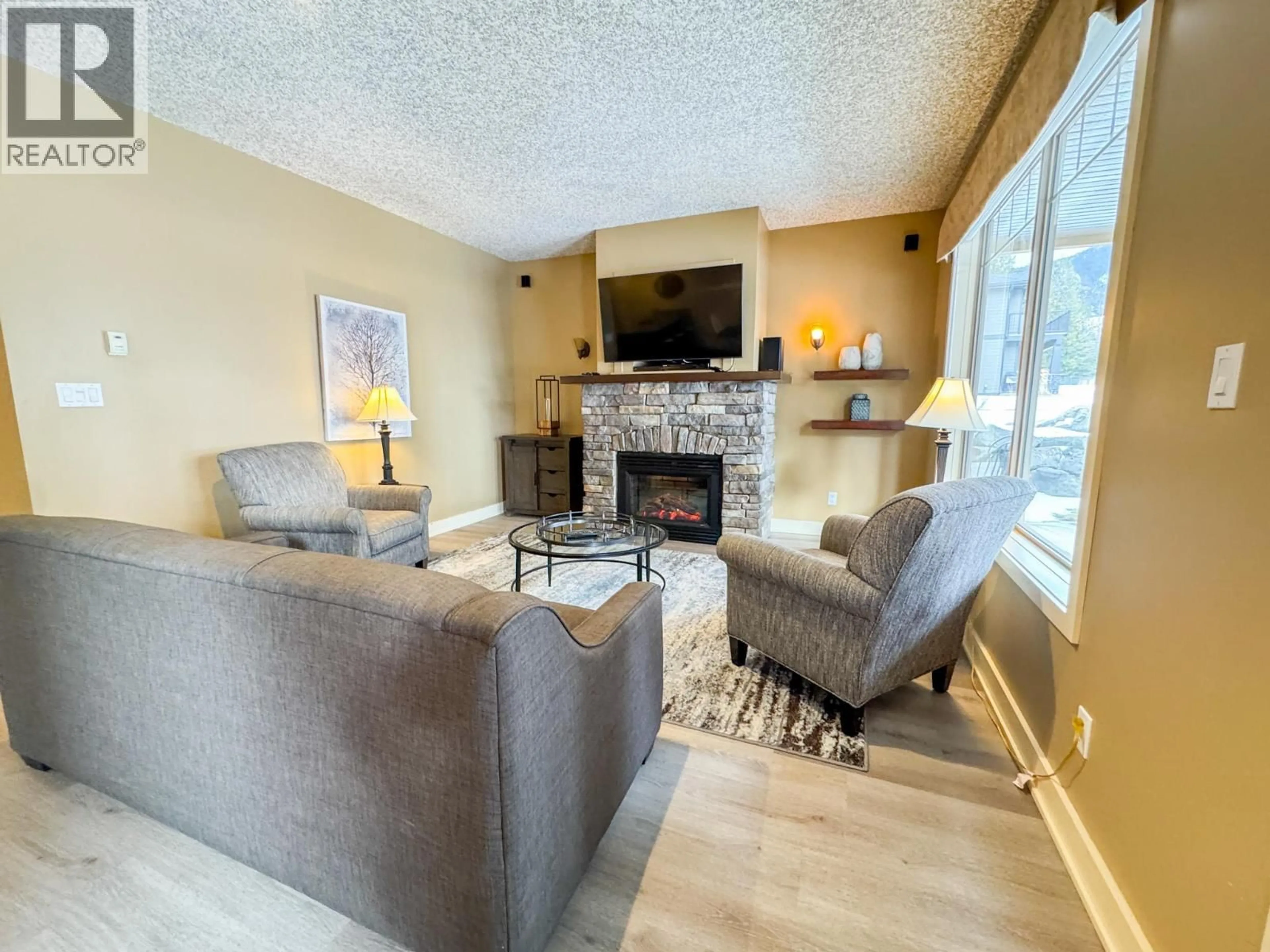 Living room with furniture, unknown for 311C - 300 BIGHORN BOULEVARD, Radium Hot Springs British Columbia V0A1M0