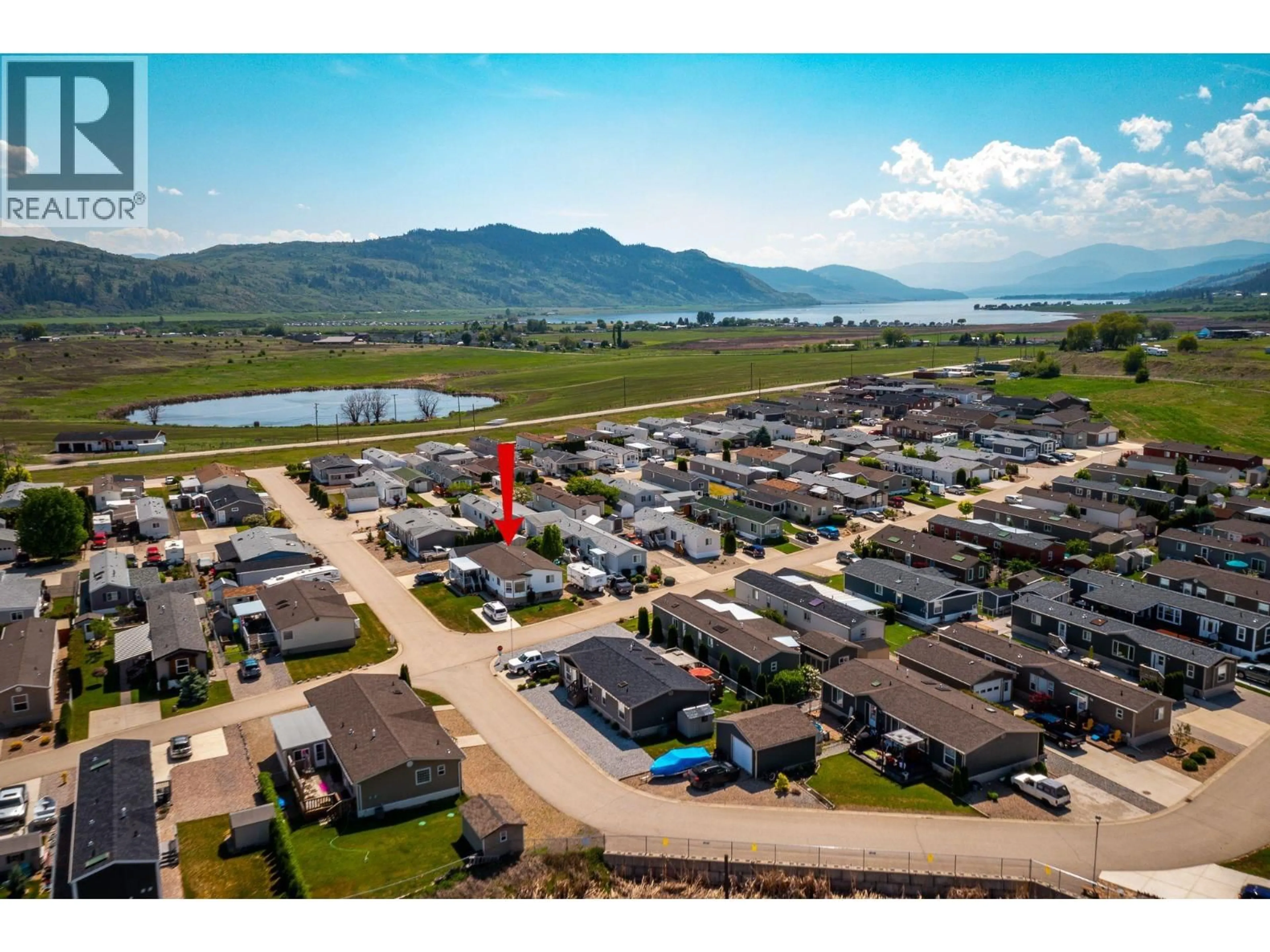 A pic from outside/outdoor area/front of a property/back of a property/a pic from drone, mountain view for 77 - 12560 WESTSIDE ROAD, Vernon British Columbia V1H1S9
