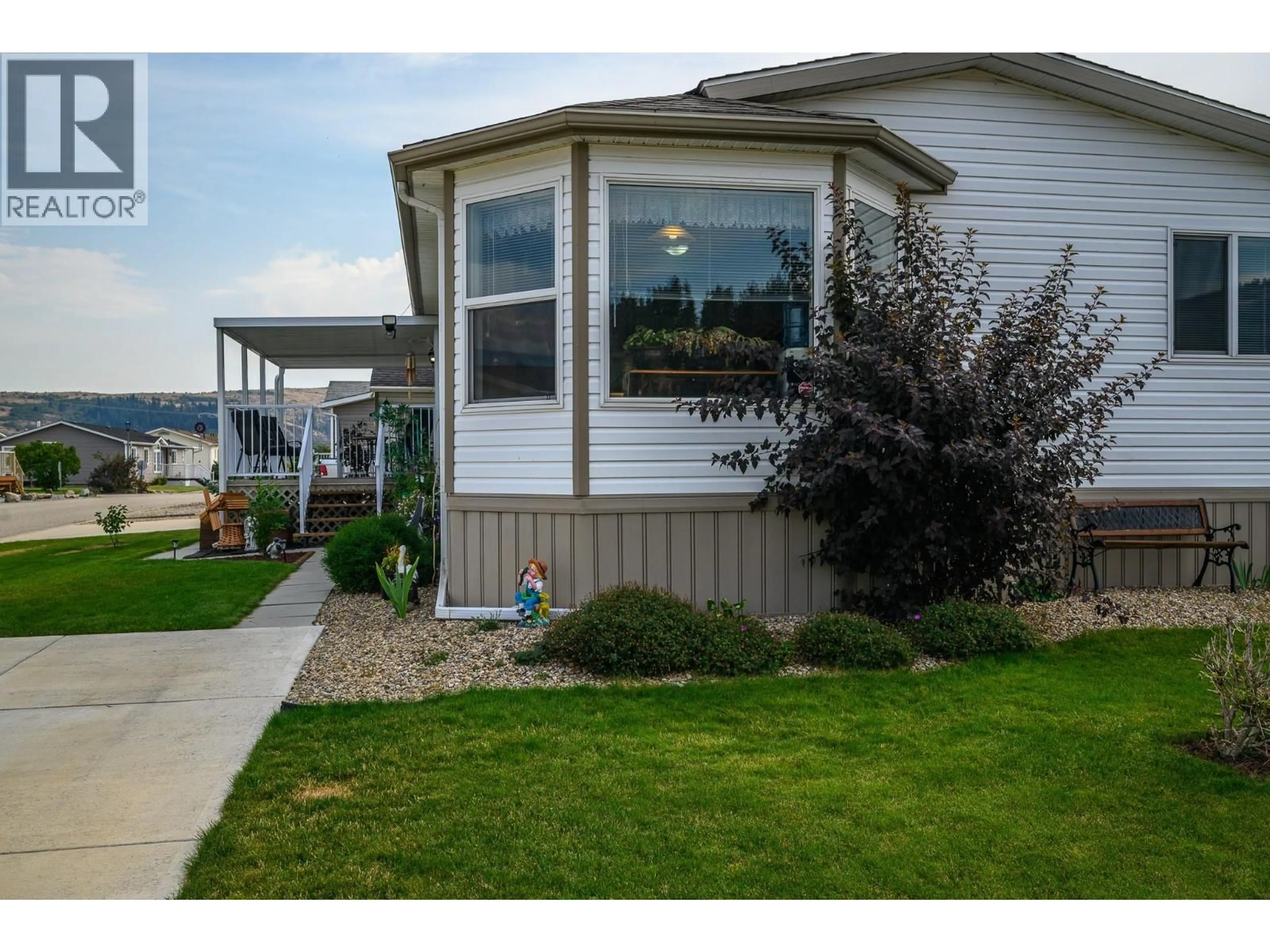 Home with vinyl exterior material, water/lake/river/ocean view for 77 - 12560 WESTSIDE ROAD, Vernon British Columbia V1H1S9