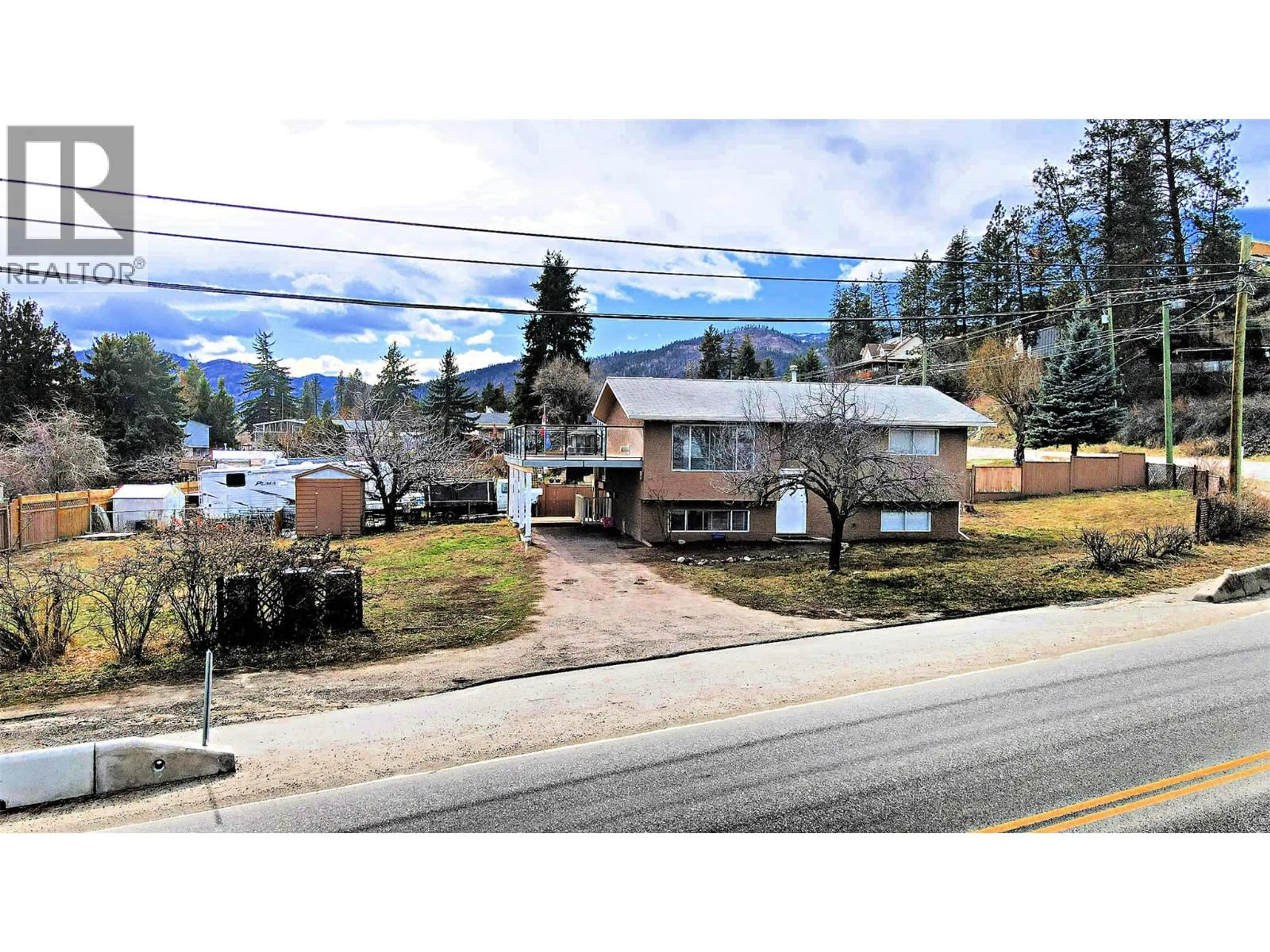 A pic from outside/outdoor area/front of a property/back of a property/a pic from drone, mountain view for 4809 PRINCETON AVENUE, Peachland British Columbia V0H1X7