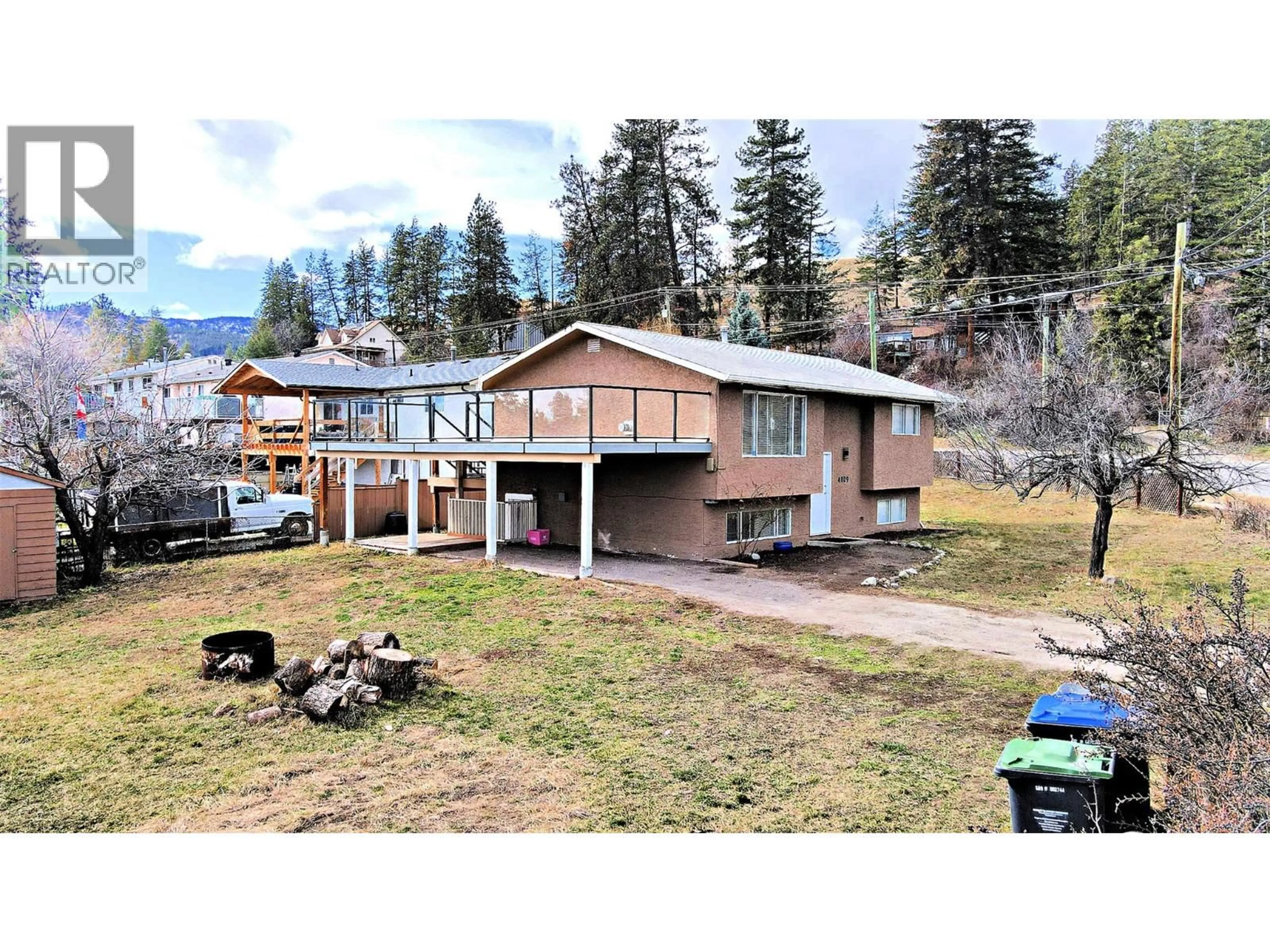 A pic from outside/outdoor area/front of a property/back of a property/a pic from drone, mountain view for 4809 PRINCETON AVENUE, Peachland British Columbia V0H1X7