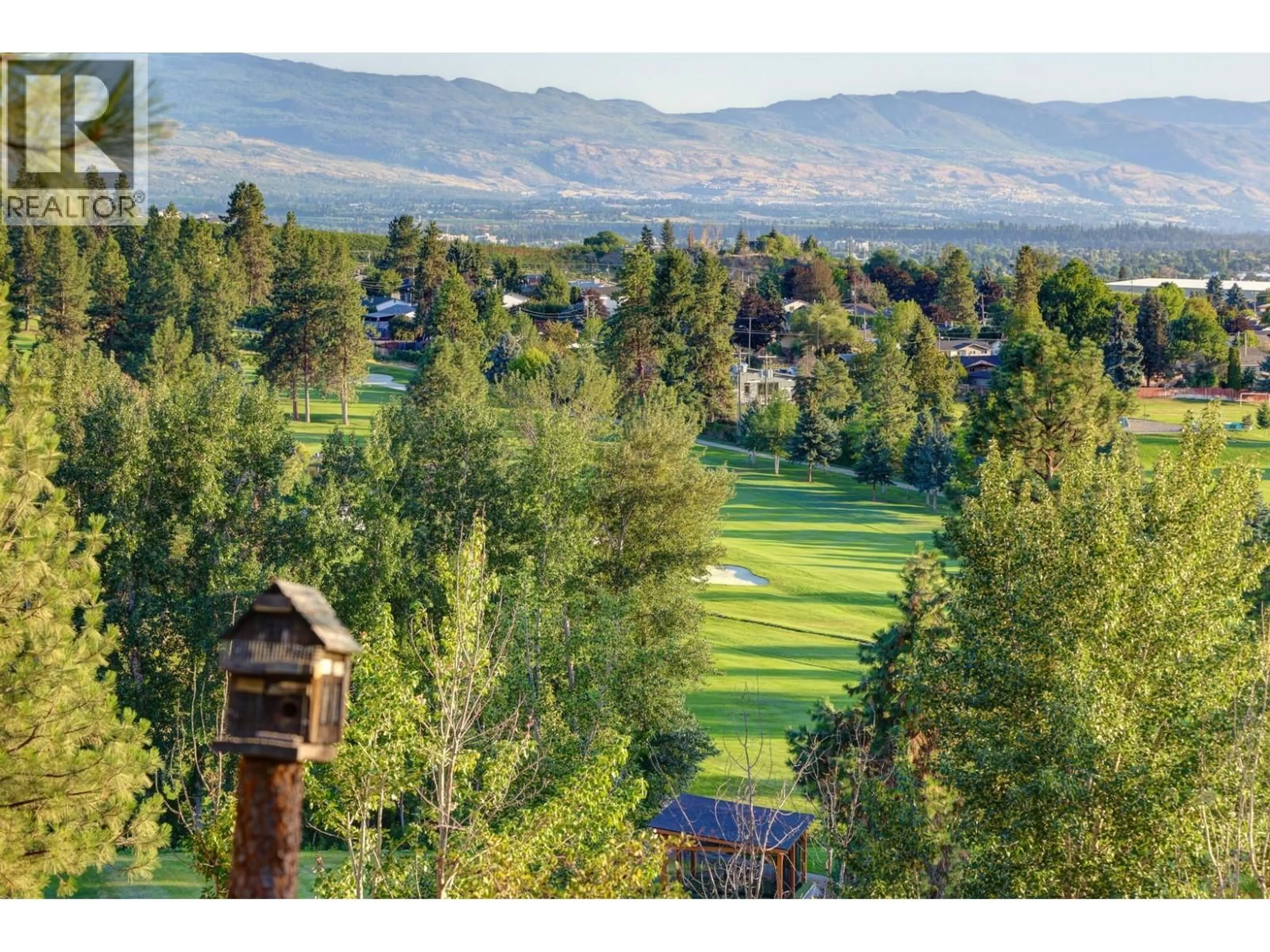 A pic from outside/outdoor area/front of a property/back of a property/a pic from drone, mountain view for 5147 SILVERADO PLACE, Kelowna British Columbia V1X7X8