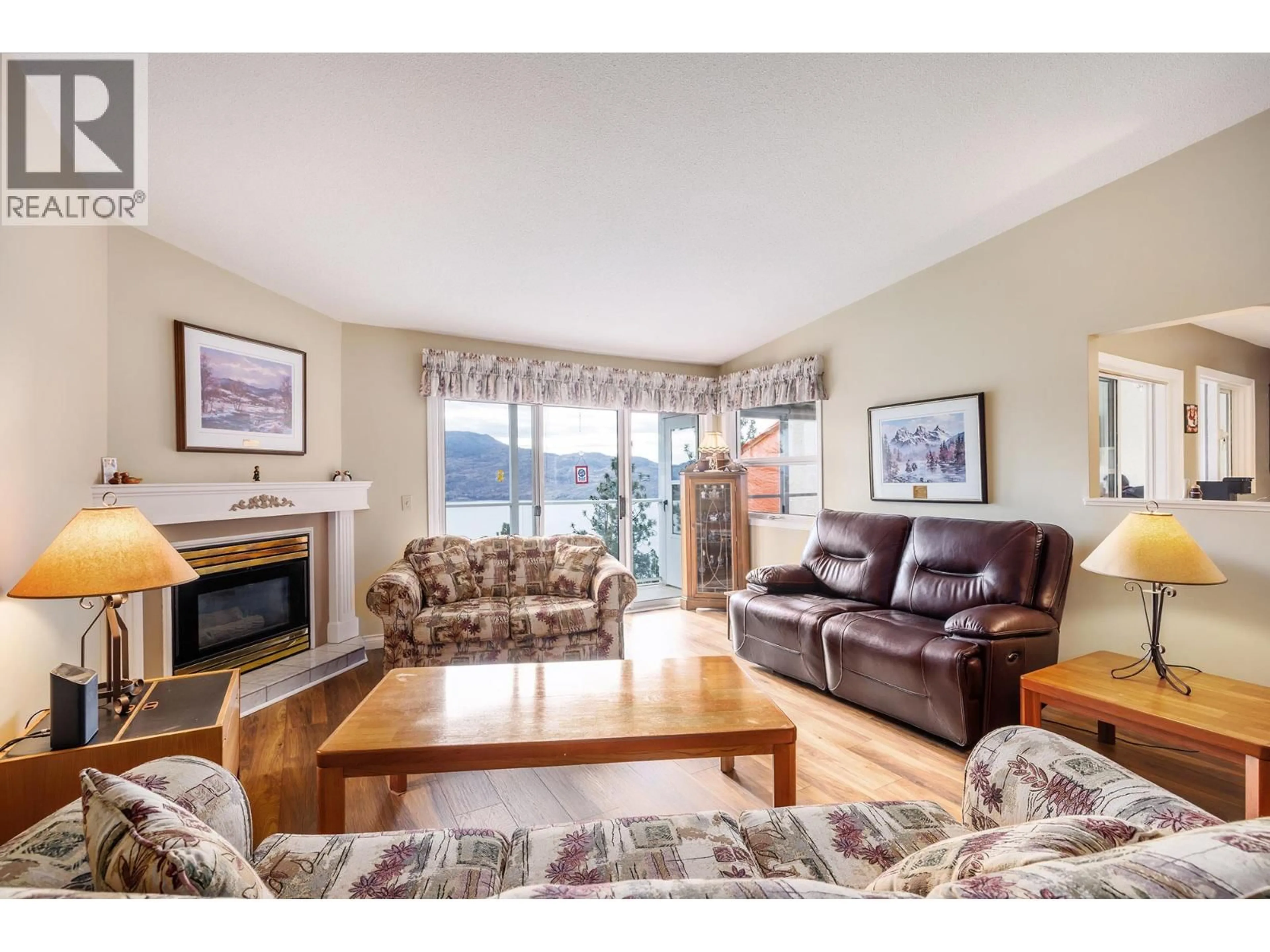 Living room with furniture, unknown for 202 - 4450 PONDEROSA DRIVE, Peachland British Columbia V0H1X5